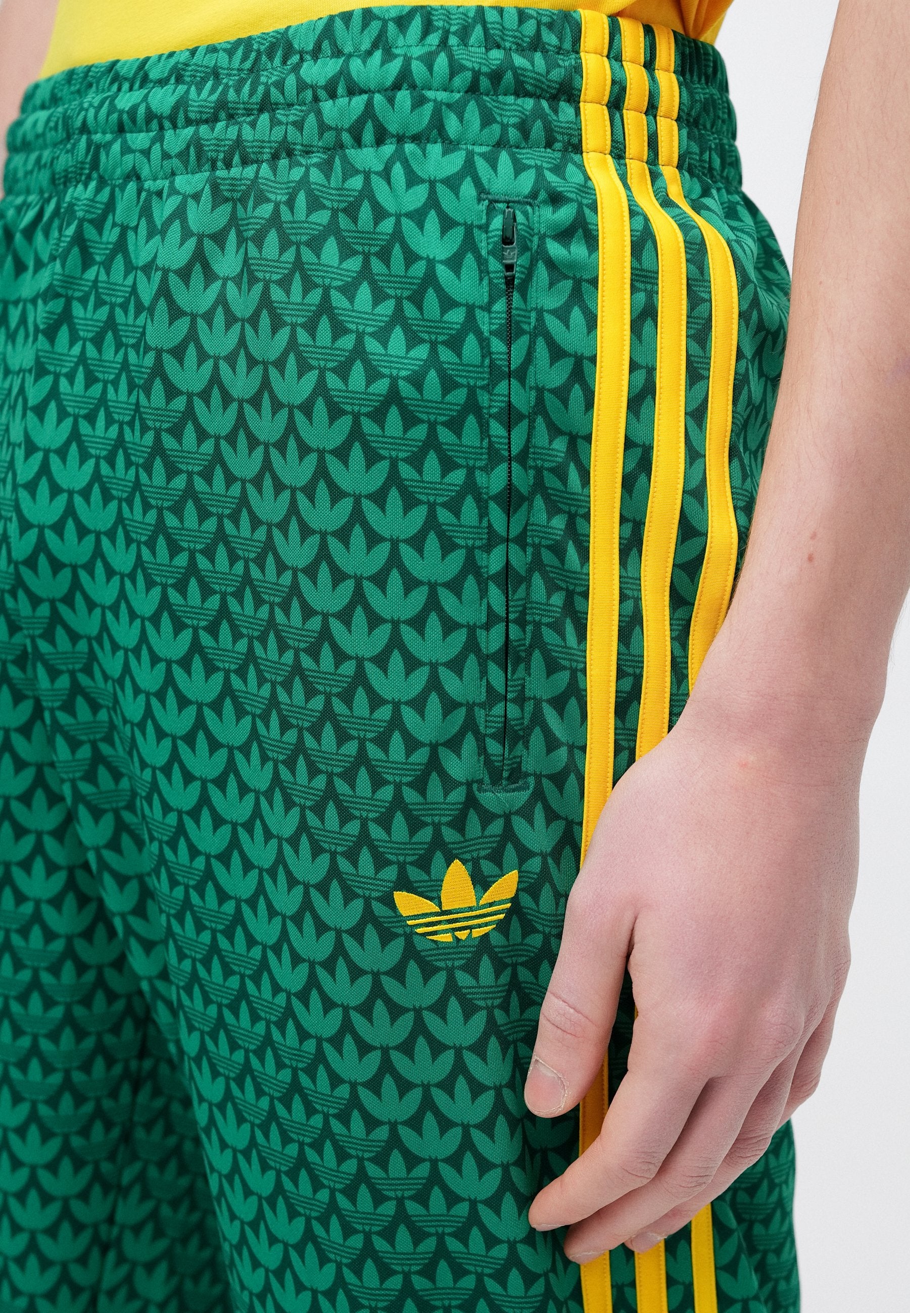 FIREBIRD MONOGRAM - Tracksuit bottoms - collegiate green