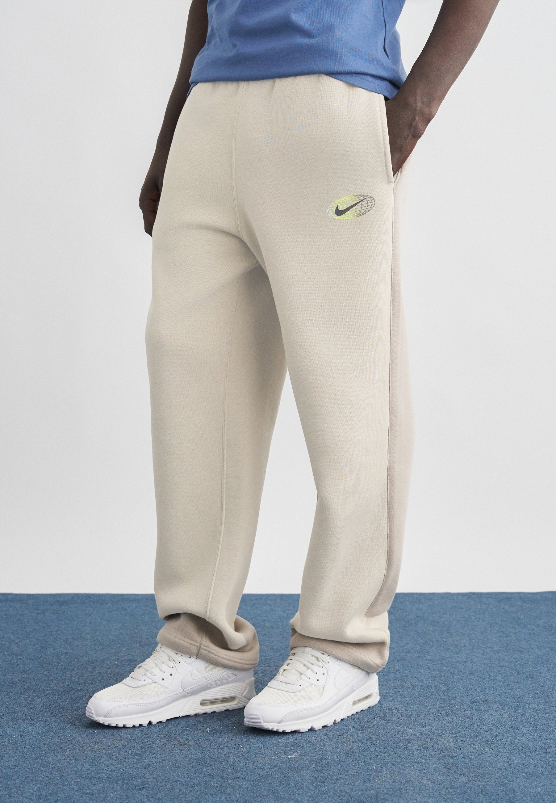 CLUB - Tracksuit bottoms - cream