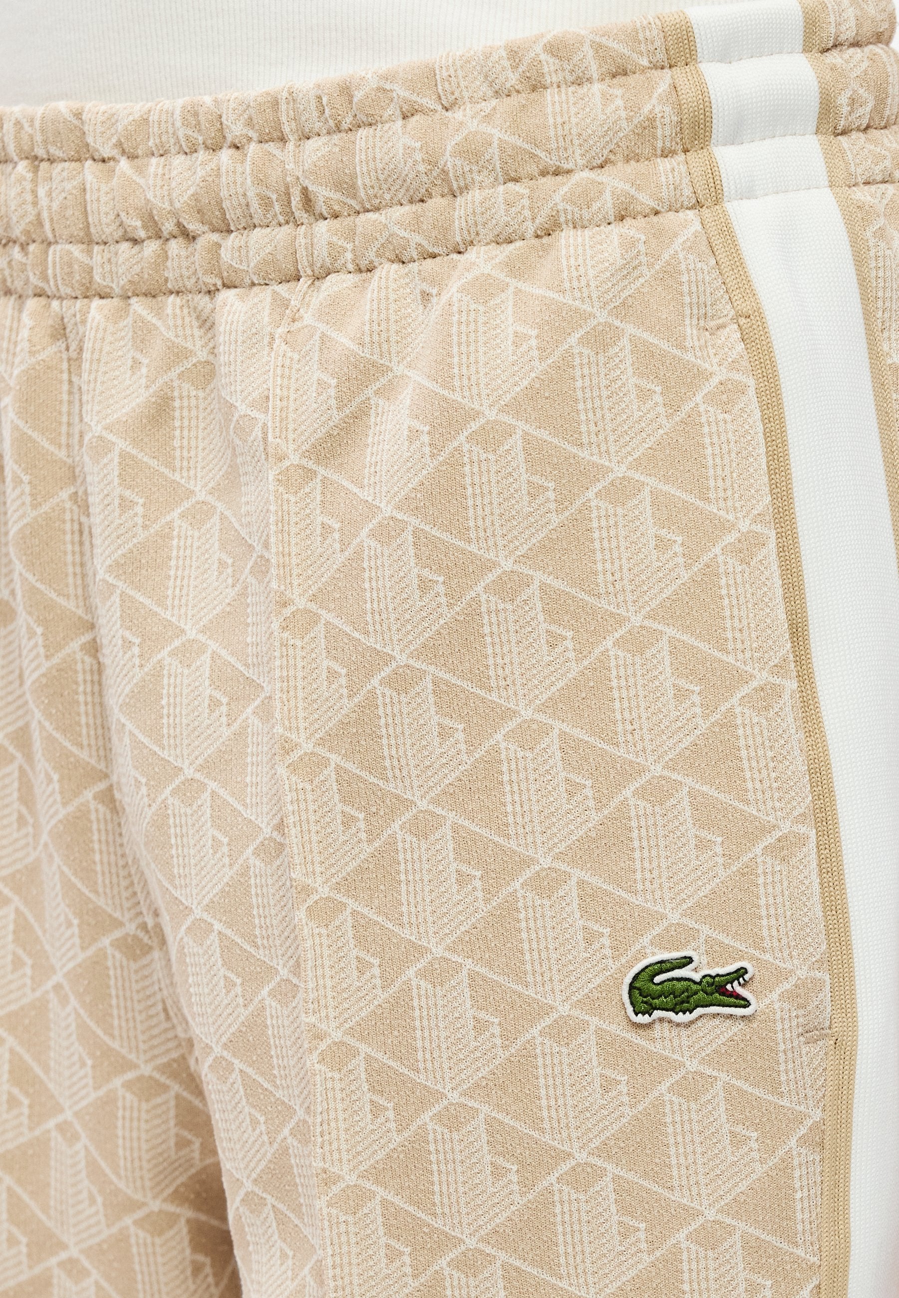 UNISEX - Tracksuit bottoms - lionne/flour