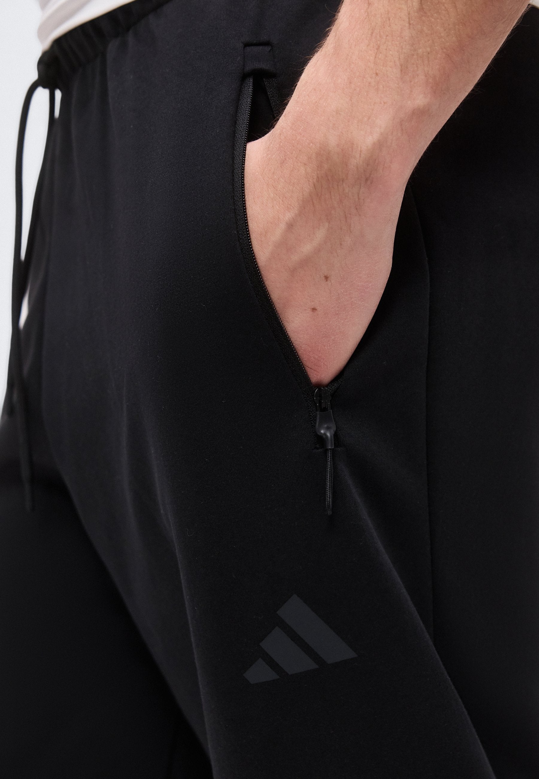 بنطلونات ADIDAS Z.N.E. - بنطلونات رياضية - أسود