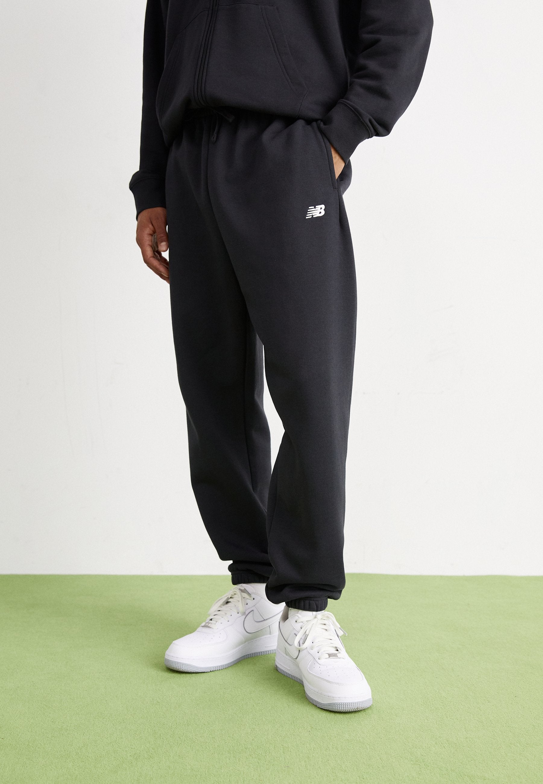 SPORT ESSENTIALS  - Tracksuit bottoms - black