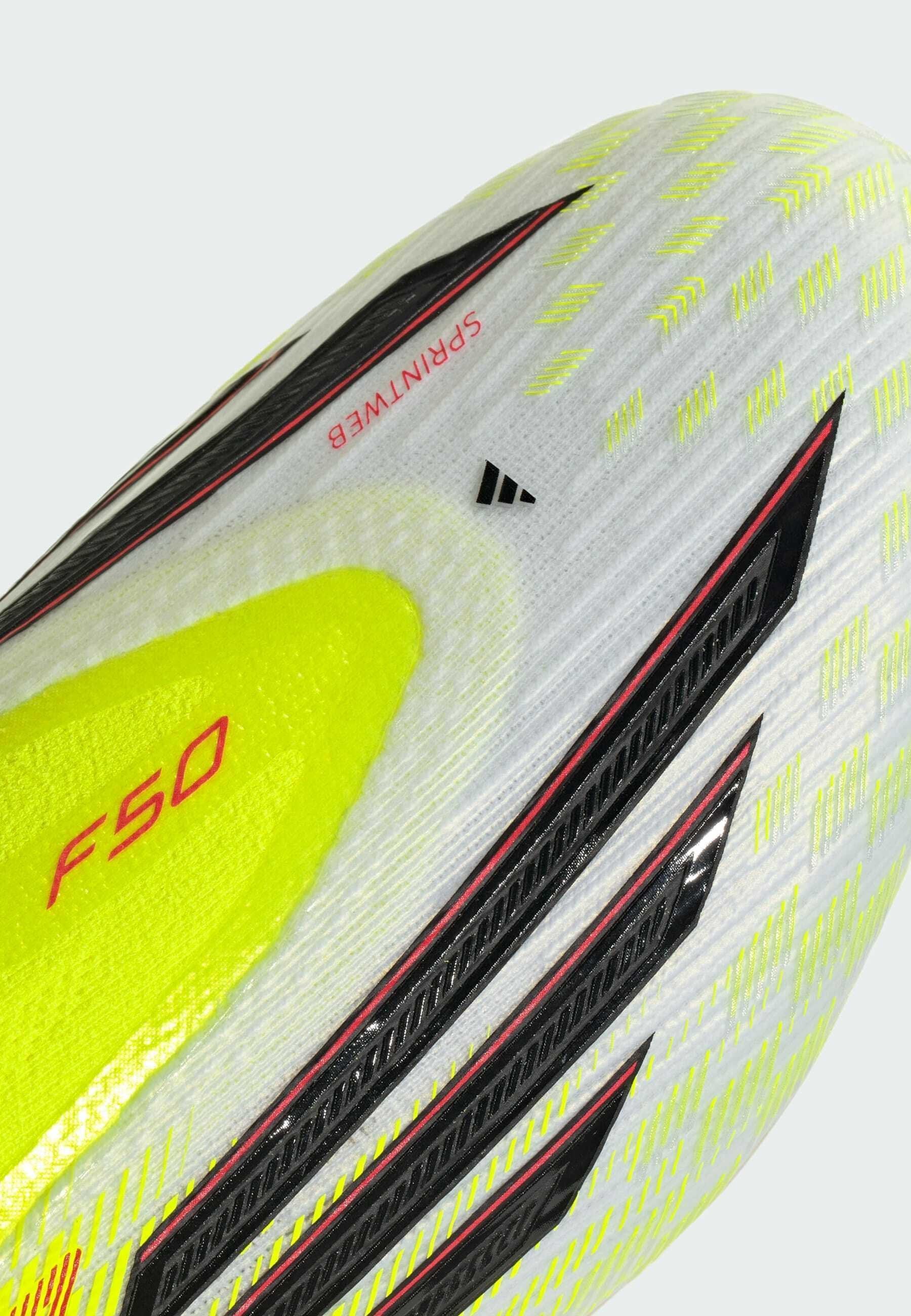 F50 ELITE LACELESS FG - Chaussures de football pour terrain sec - jaune solaire/noir/rouge vif