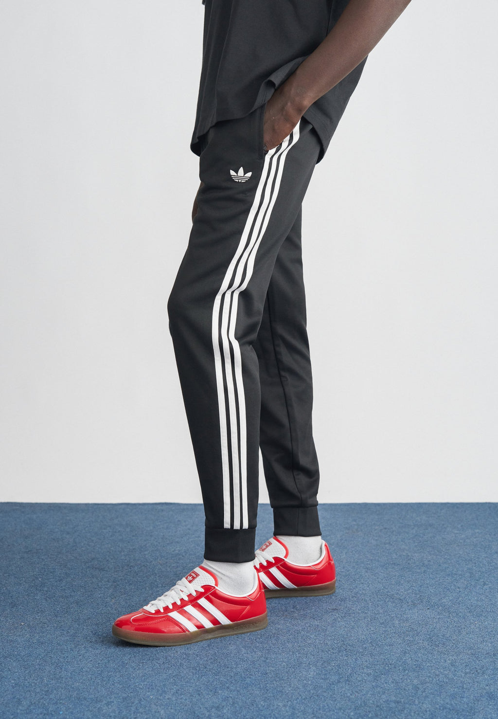 SST TP - Tracksuit bottoms - black