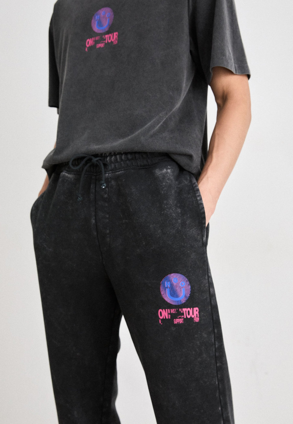 NEVEZ  - Tracksuit bottoms - black