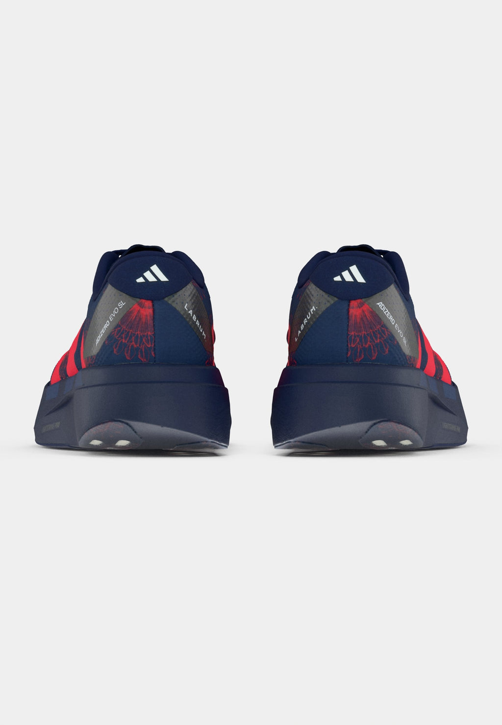 ADIZERO EVO SL - Trainers - dark blue/lucid red/muted purple