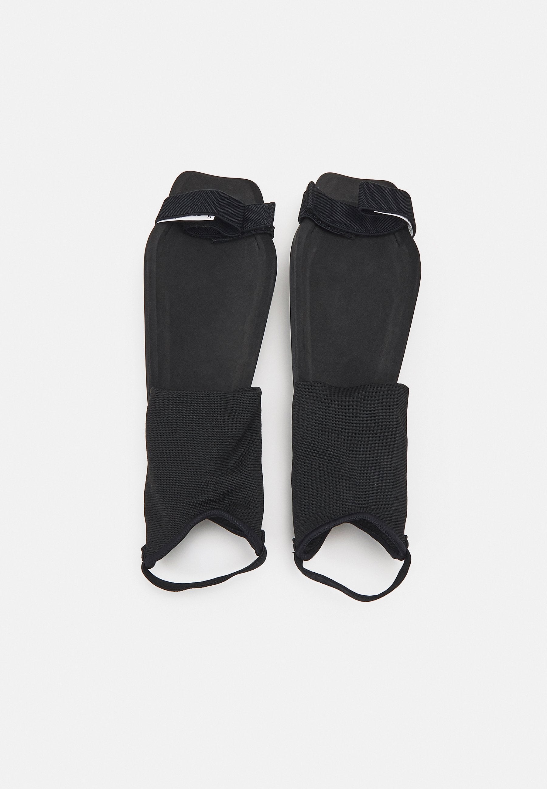 CHARGE - Shin pads - schwarz/weiss