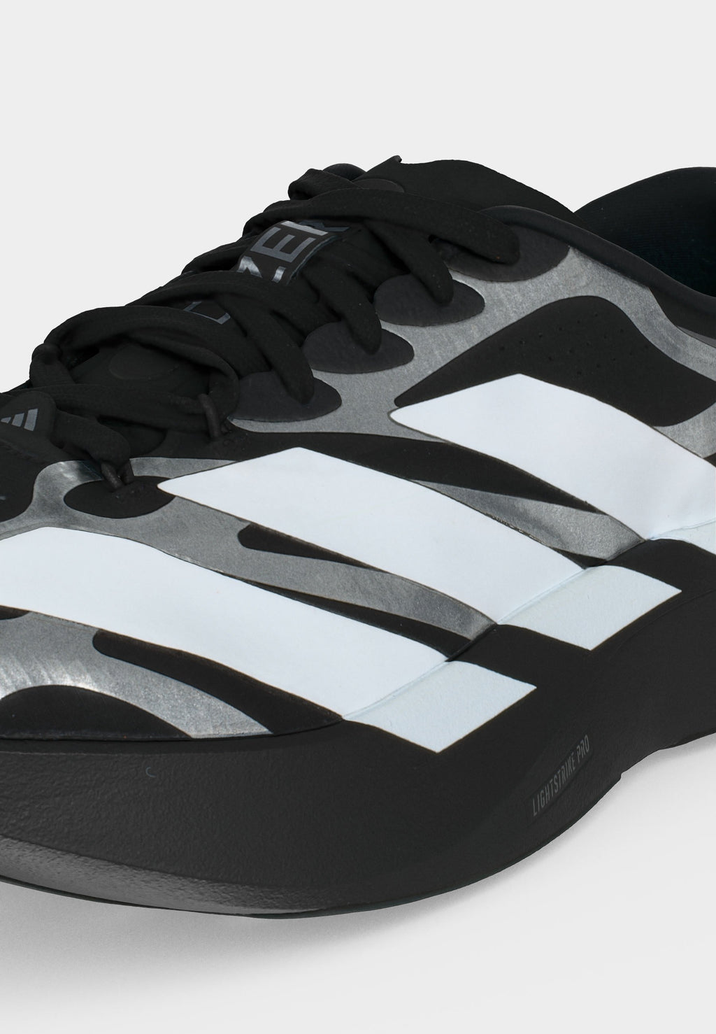 ADIZERO EVO SL EXO M - Trainers - core black/footwear white/iron metallic
