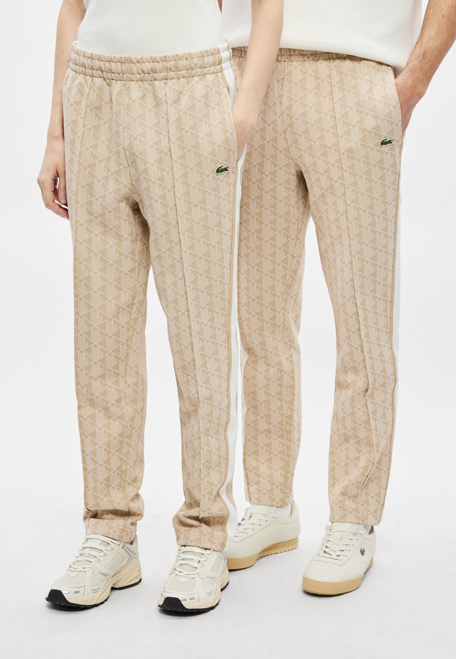 UNISEX - Tracksuit bottoms - lionne/flour