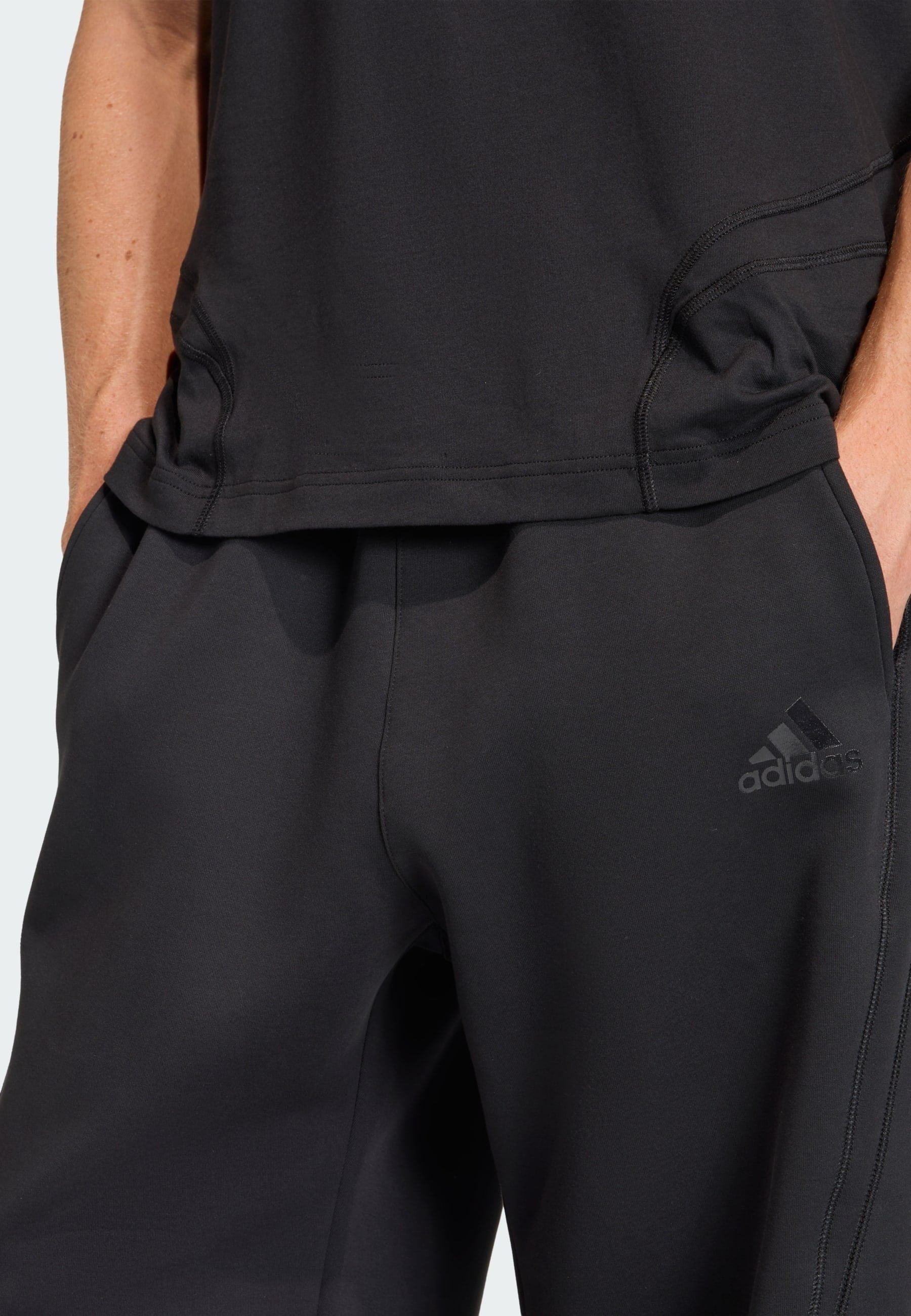 SPACER OPEN HEM - Tracksuit bottoms - black