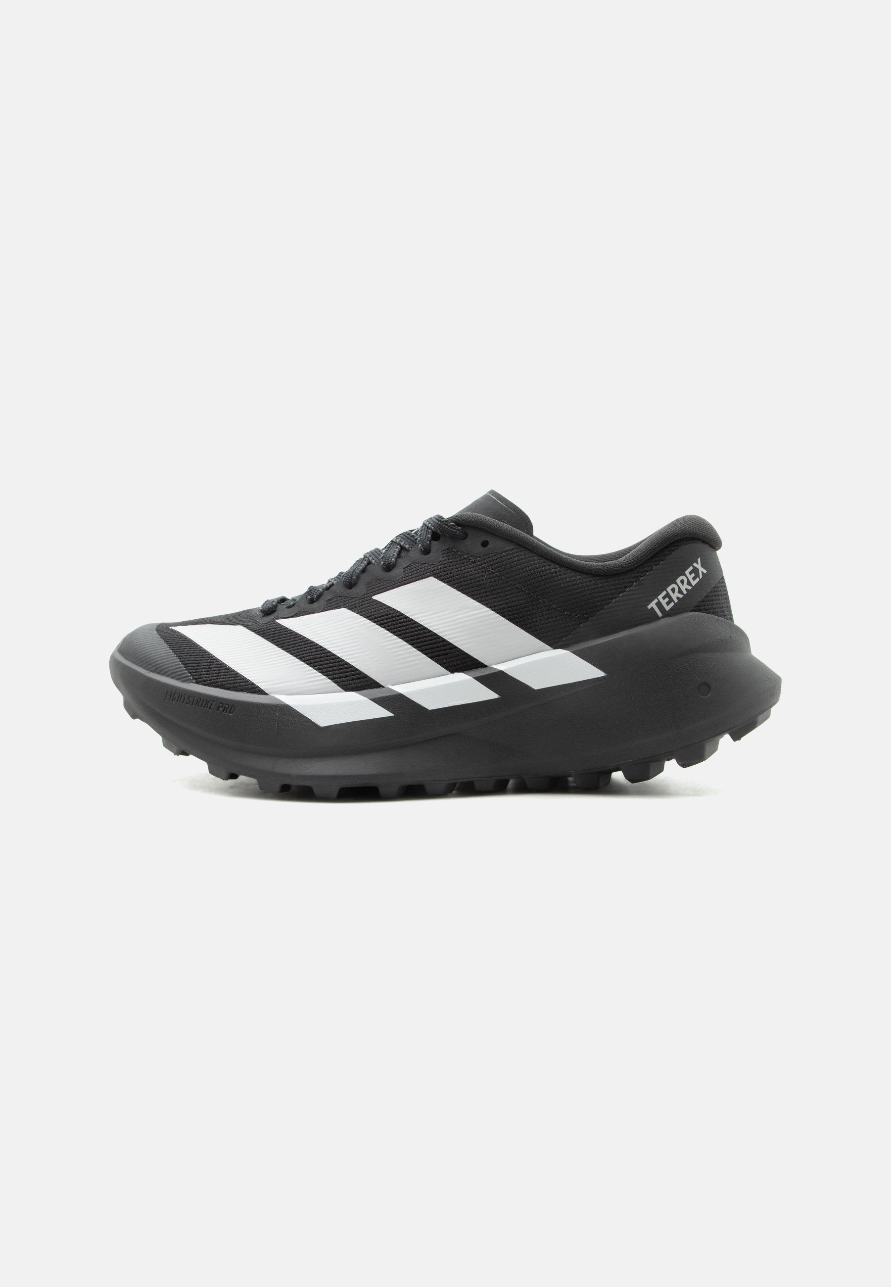 AGRAVIC - Trail running shoes - core black/grey two