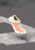 ADIZERO BOSTON - Road running shoes - off white/beam orange/acid orange