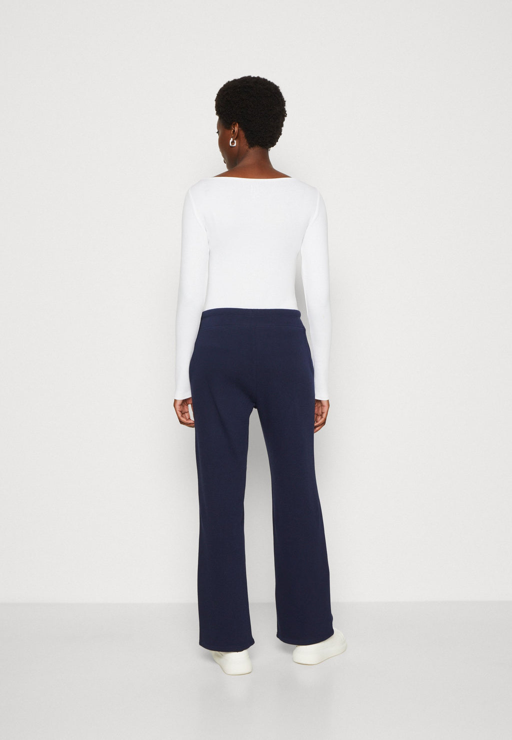 HERITAGE - Tracksuit bottoms - navy