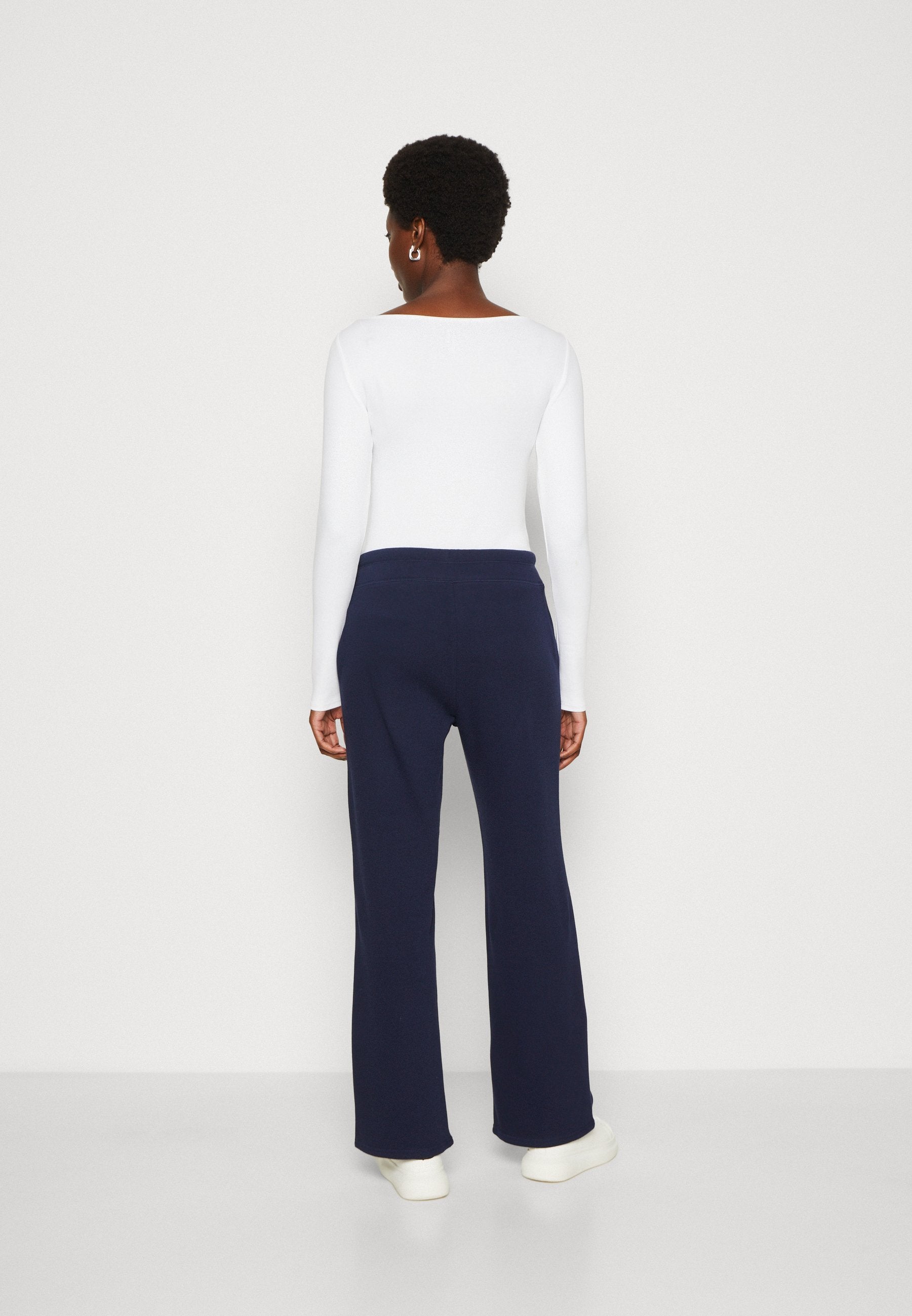 HERITAGE - Tracksuit bottoms - navy