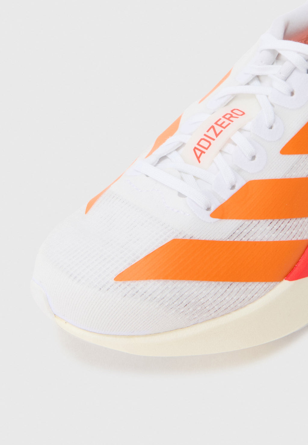 ADIZERO EVO SL J UNISEX - Road running shoes - white/pure orange/lucid red