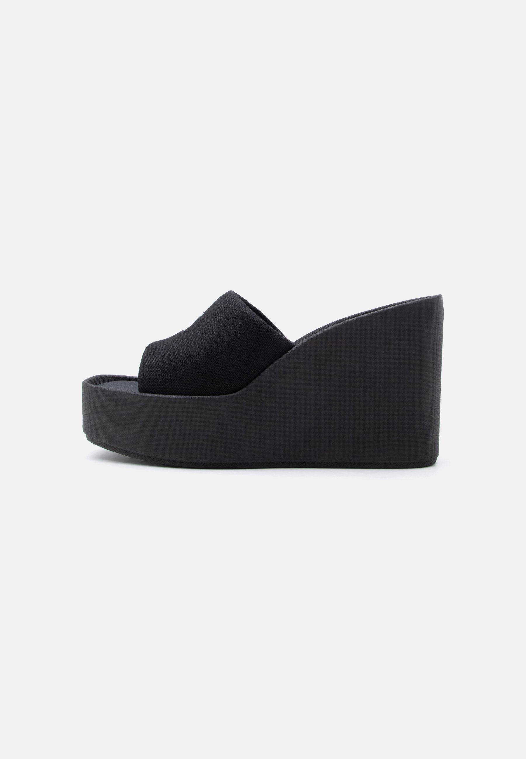 Heeled mules - triple black
