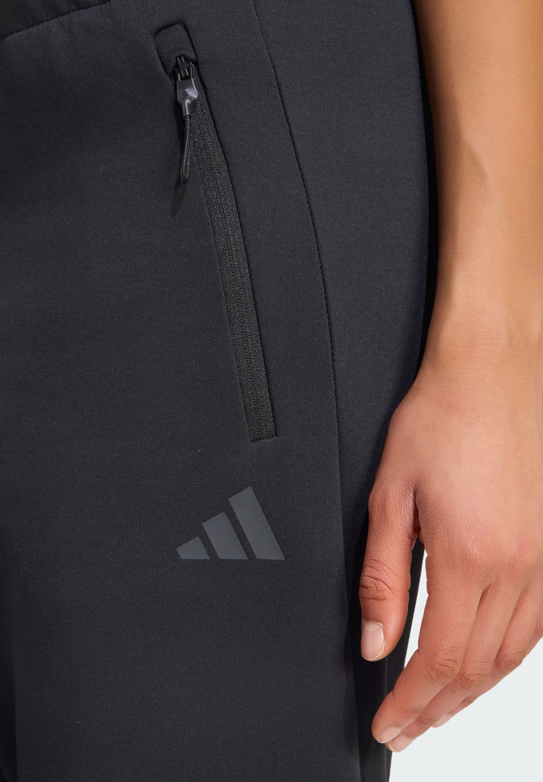 ADIDAS Z.N.E. PANTS - Tracksuit bottoms - black