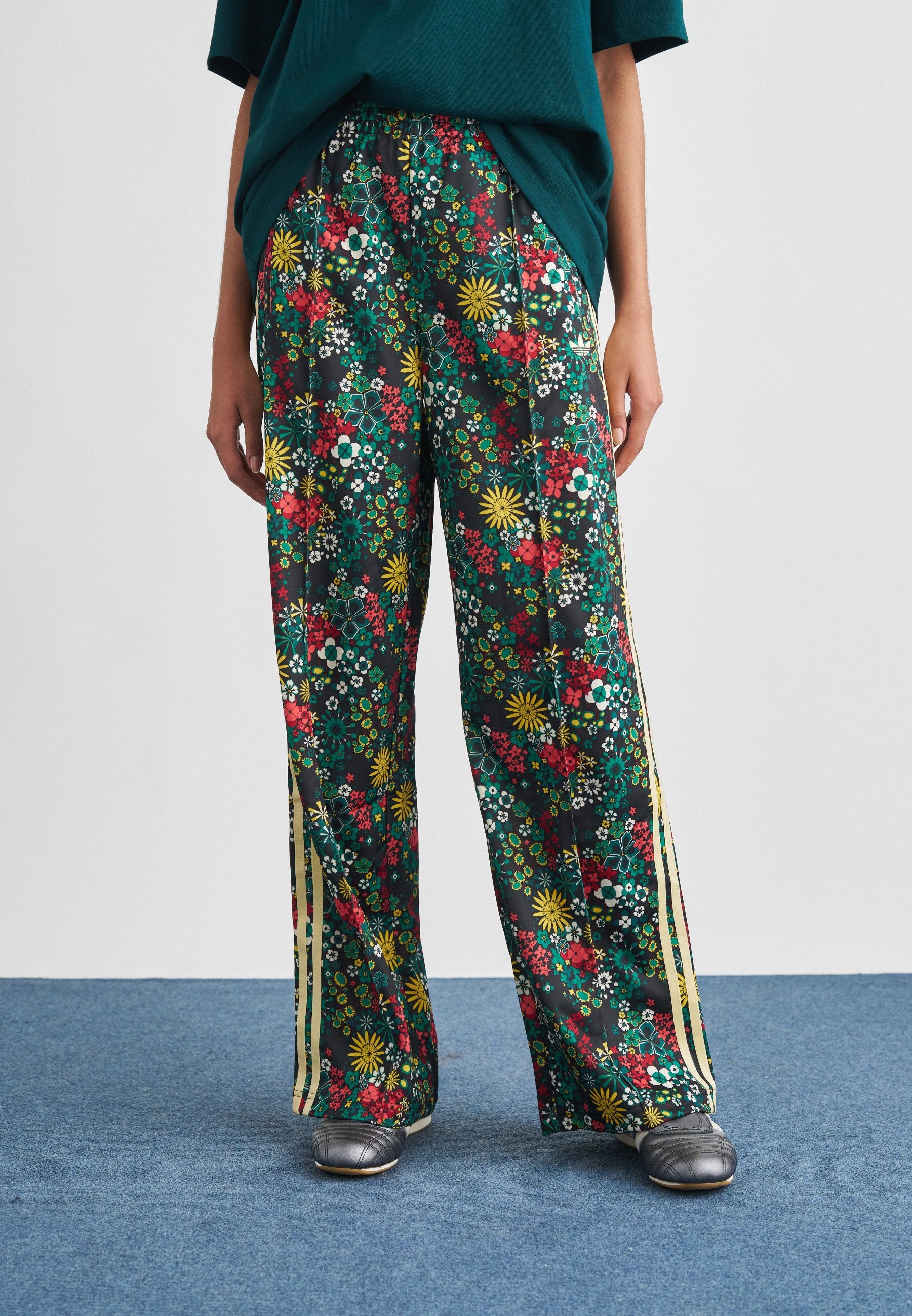 FIREBIRD LOOSE LIBERTY - Tracksuit bottoms - black/bold green/collegiate green/yellow