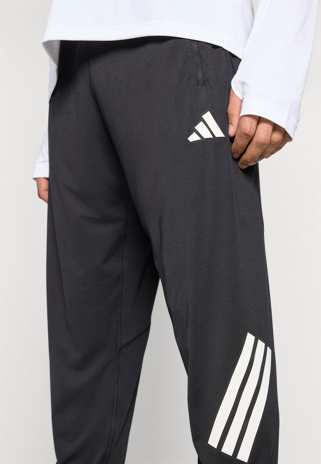 ADI365 - Tracksuit bottoms - black