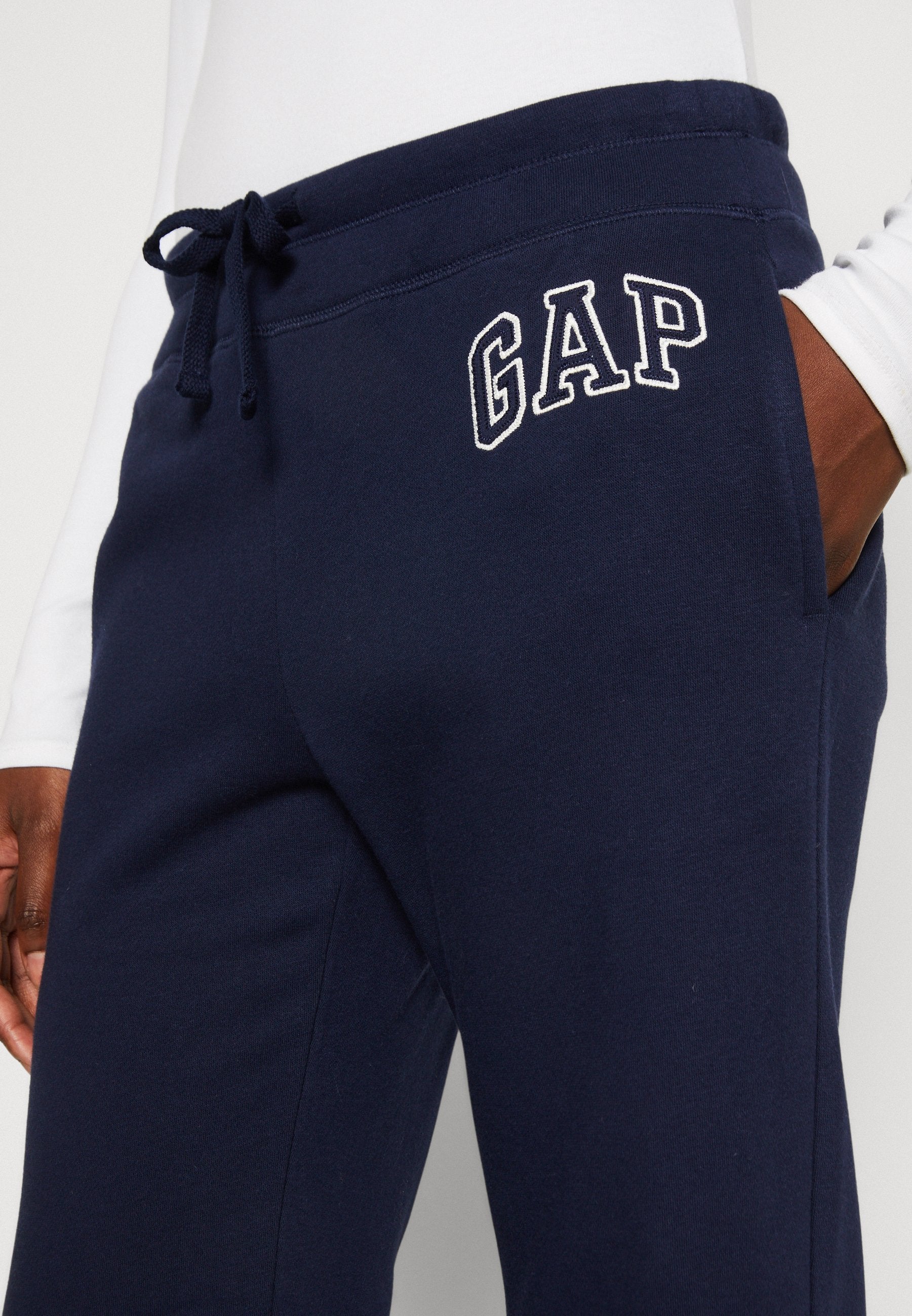 HERITAGE - Tracksuit bottoms - navy