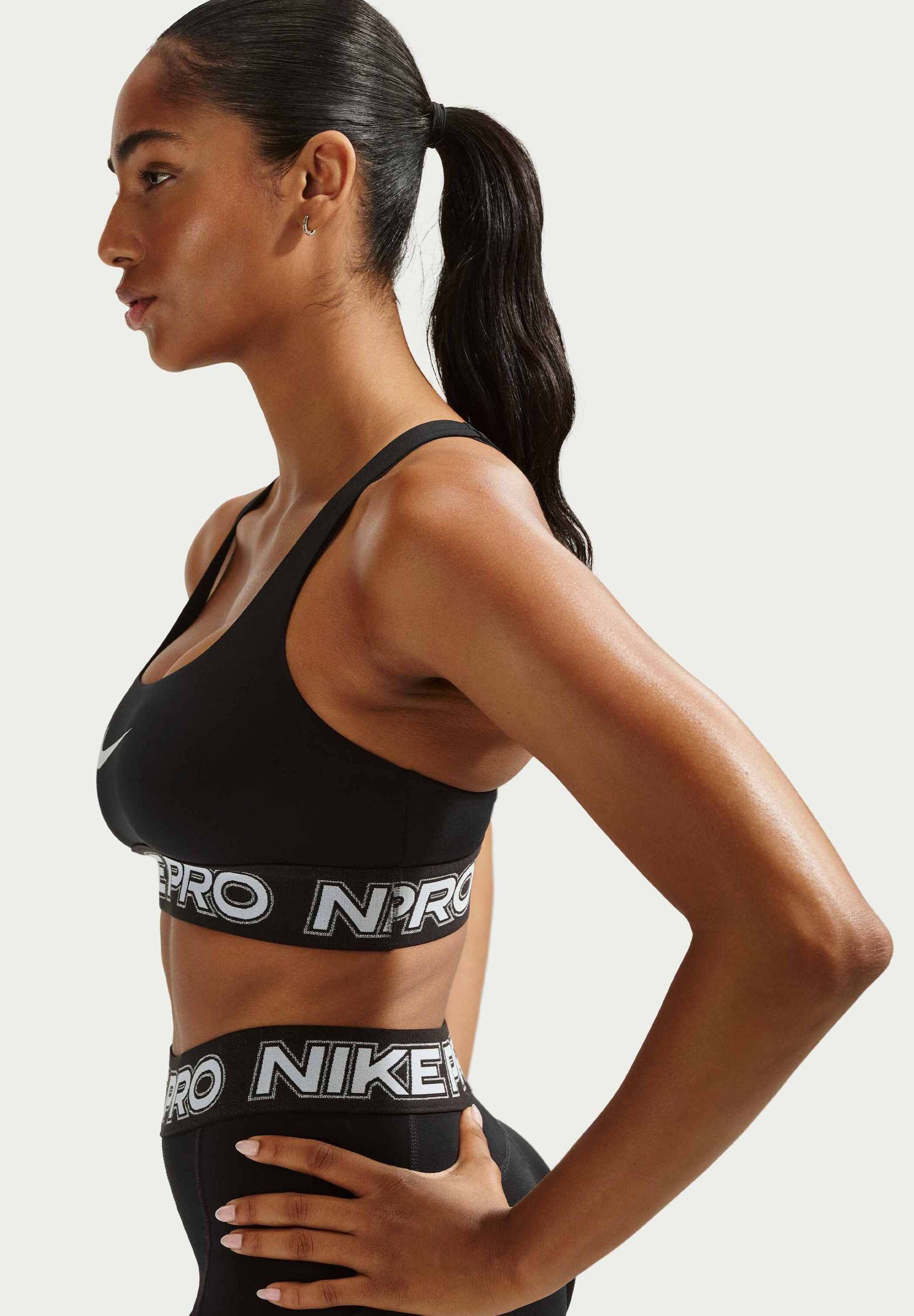 W NP DF BRA TT GRX - Medium support sports bra - black/white/metallic silver
