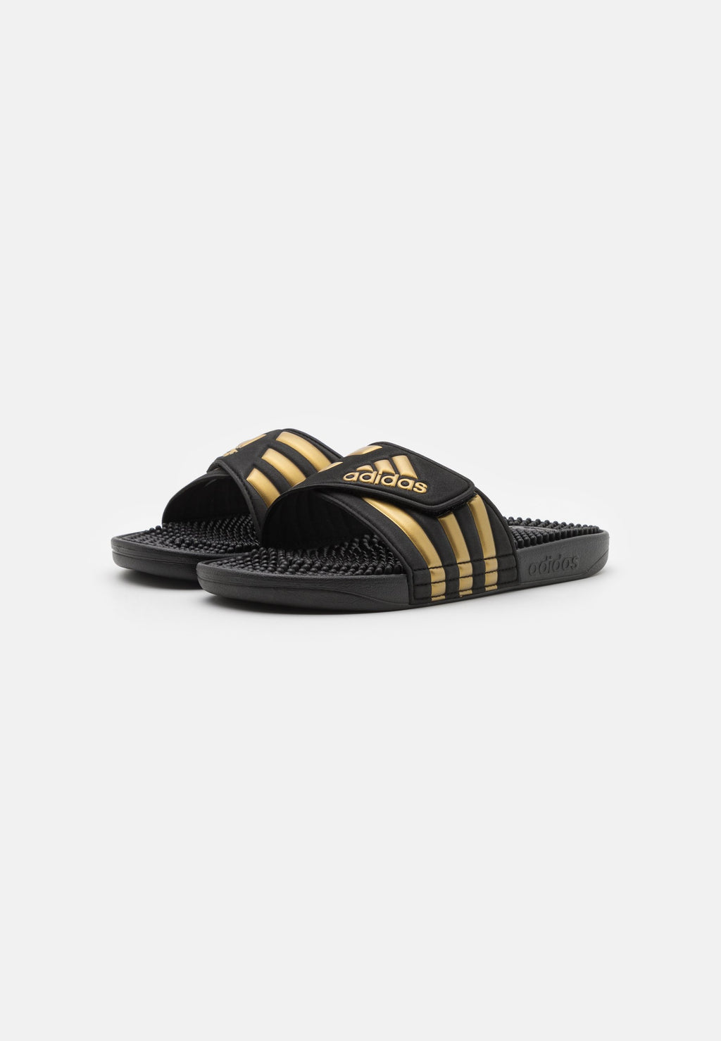 ADISSAGE - Pool slides - core black/gold metallic