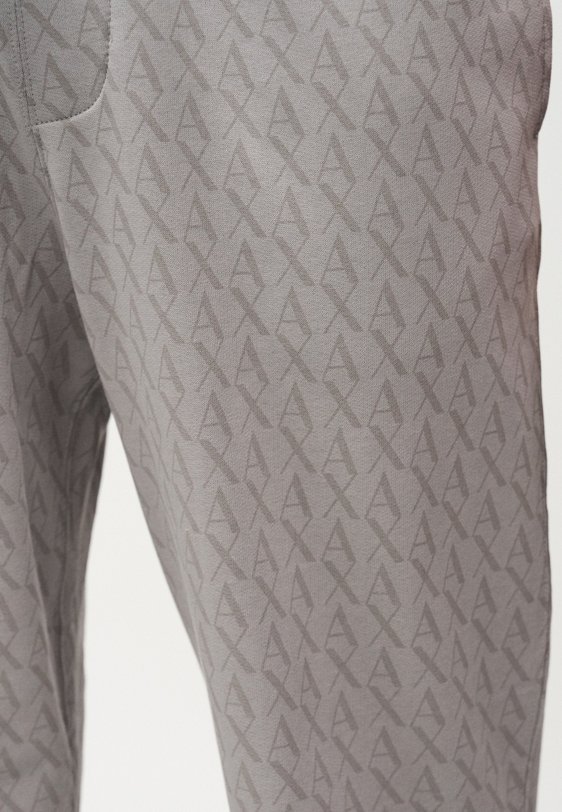 AX LOGO JOGGER PANTS - Tracksuit bottoms - chiseled stone