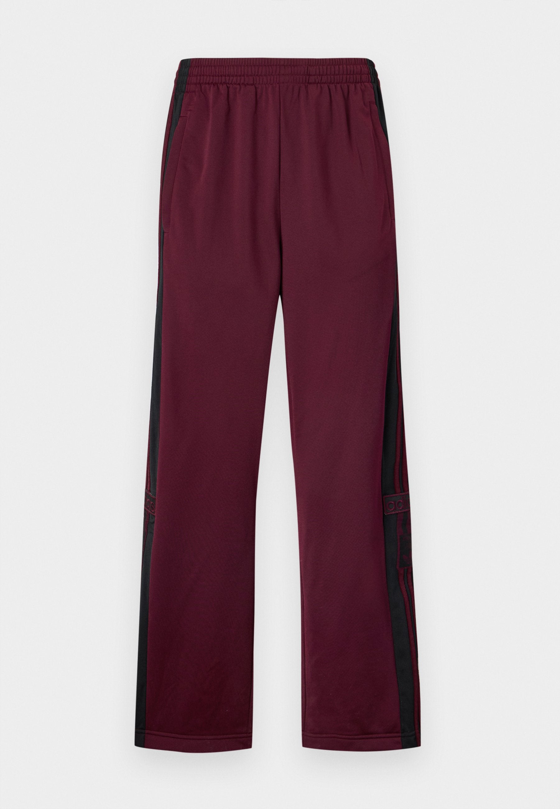 ADIBREAK UNISEX - Tracksuit bottoms - maroon