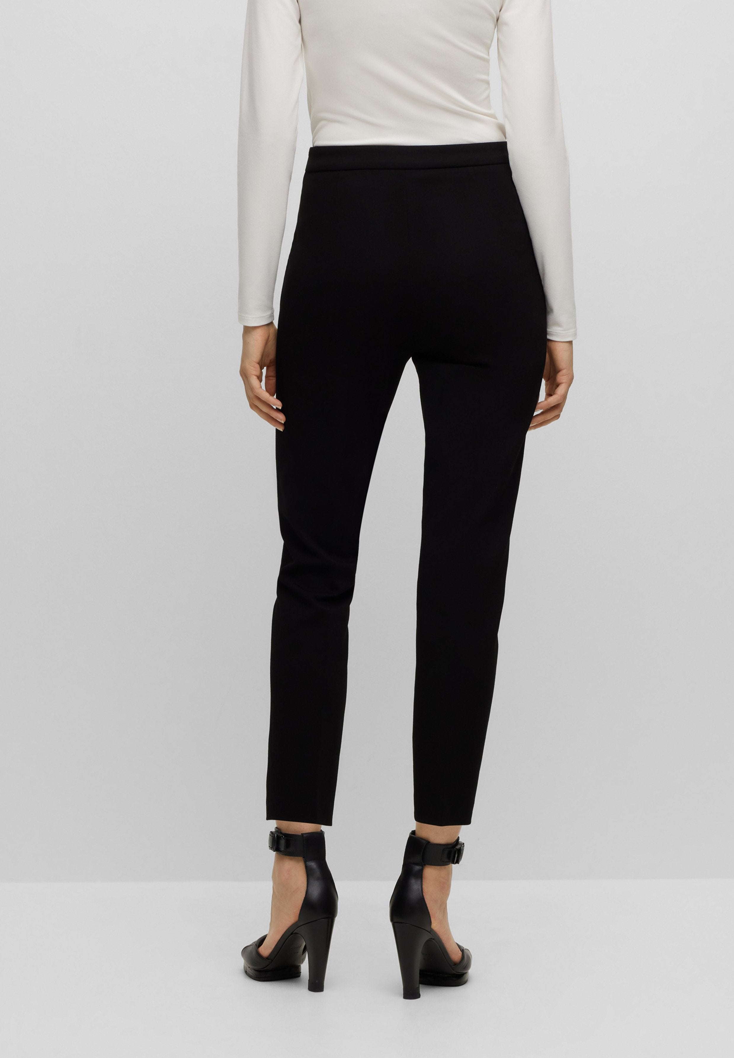 TILUNARA - Trousers - black