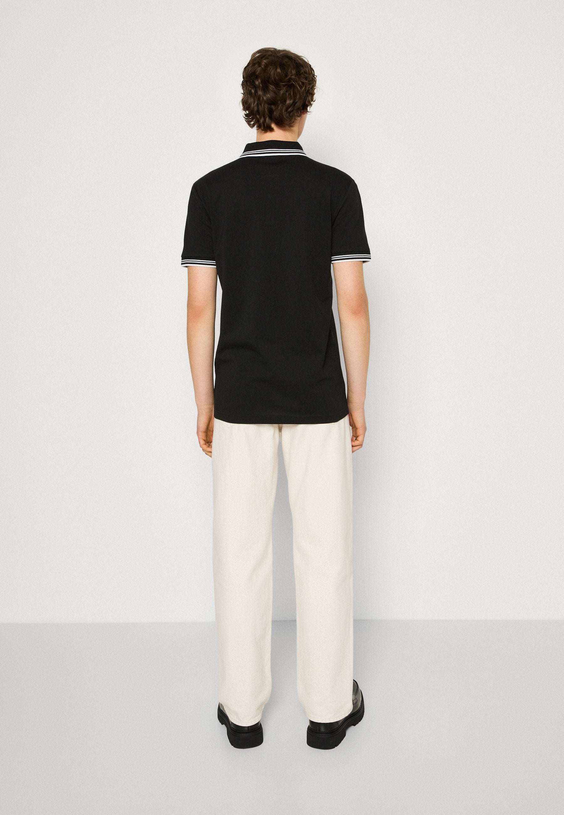 PAUL - Polo shirt - black