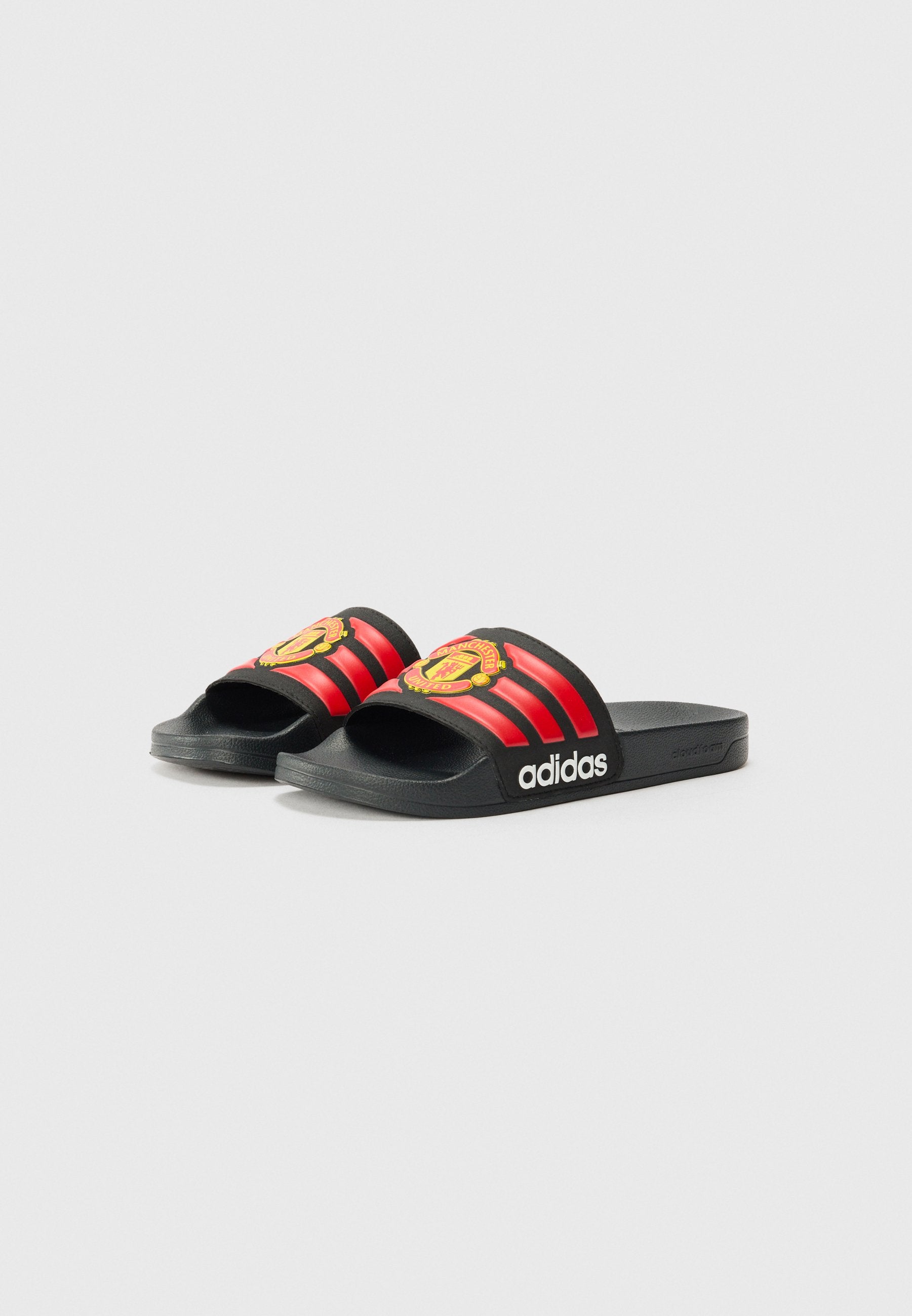 ADILETTE MANCHESTER UNITED UNISEX - نعال حمام - أسود أساسي/أحمر/أبيض