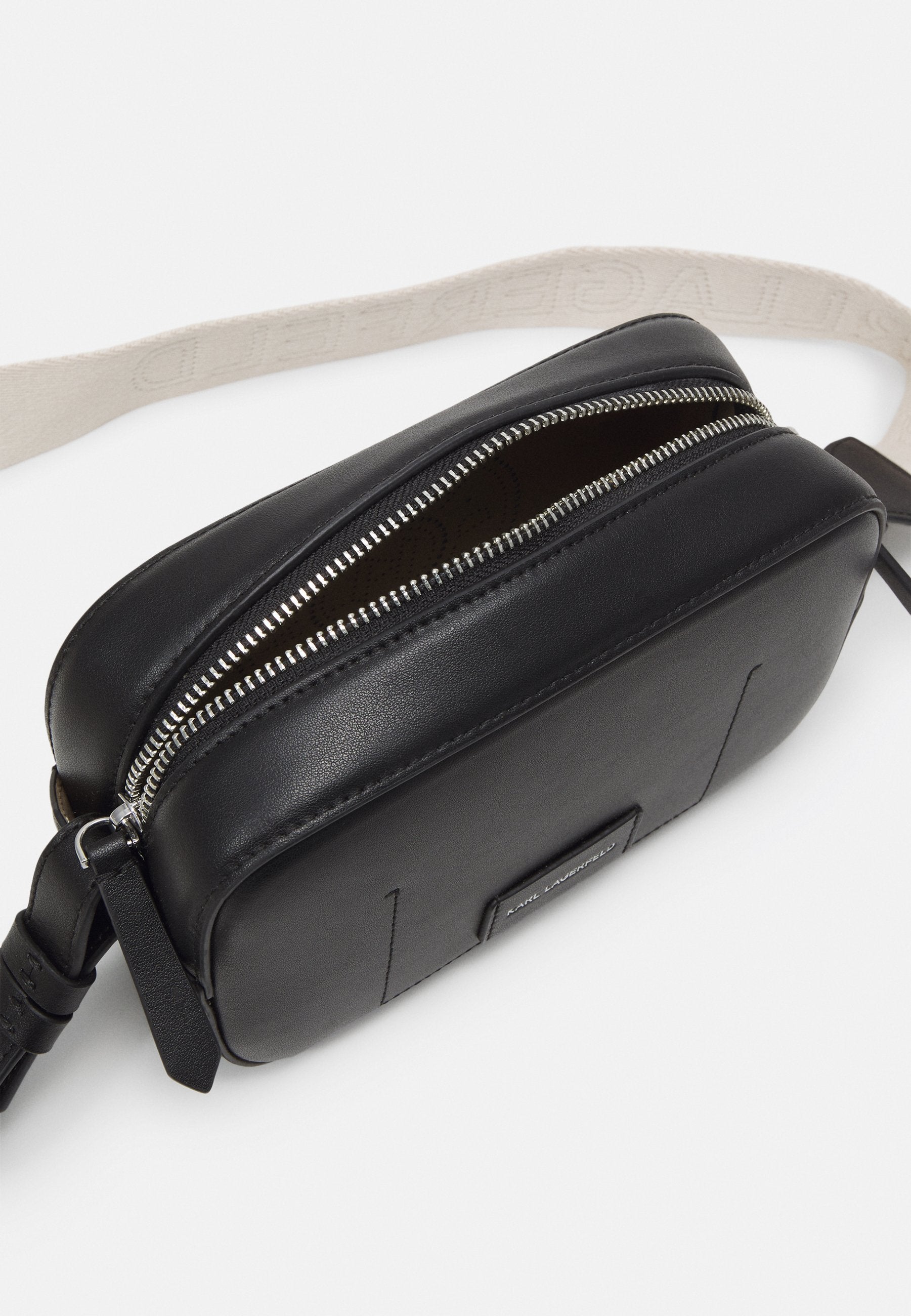 CIRCLE CAMERABAG PERFORATED - Cross body bag - black
