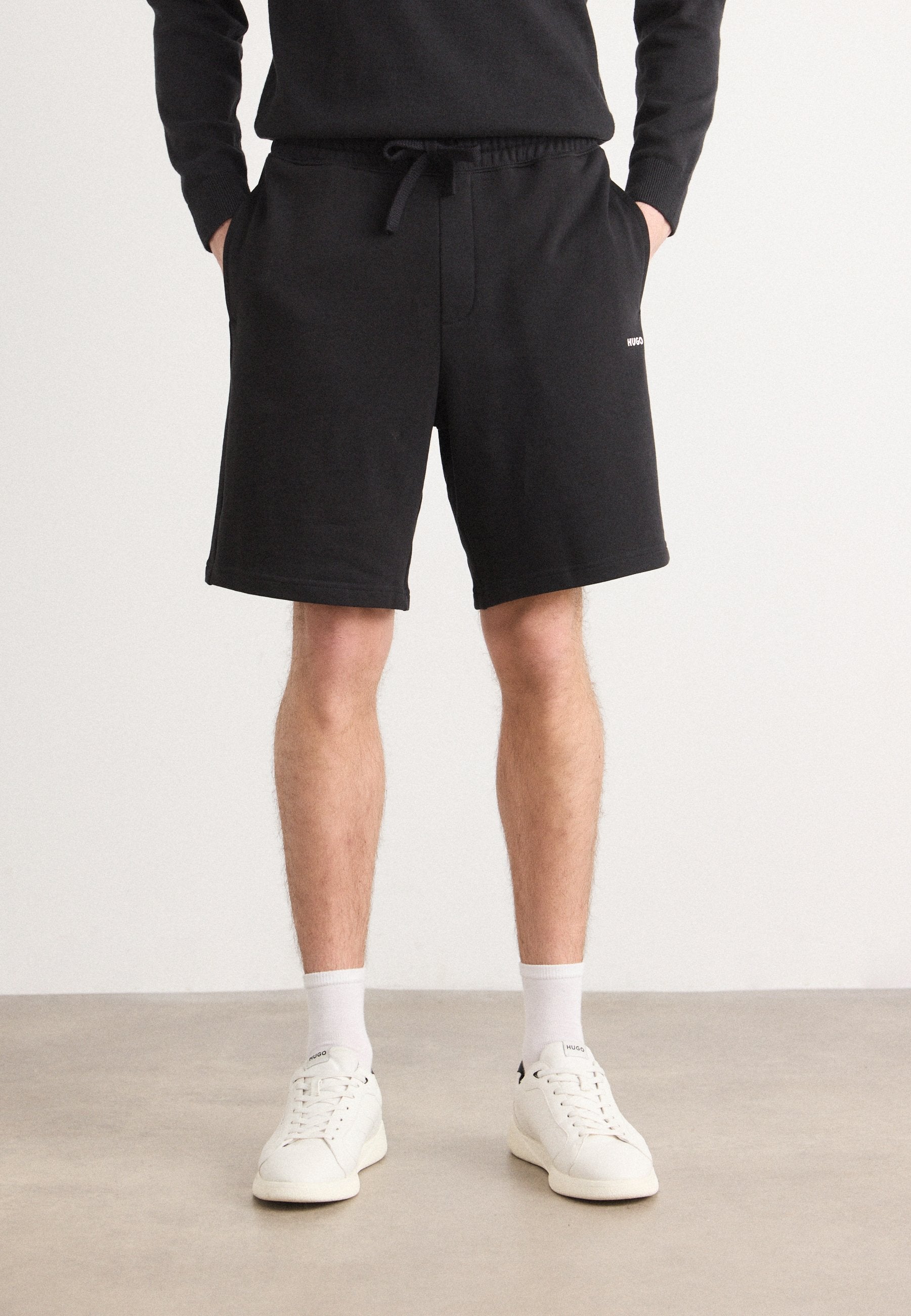 DAYONO - Tracksuit bottoms - black
