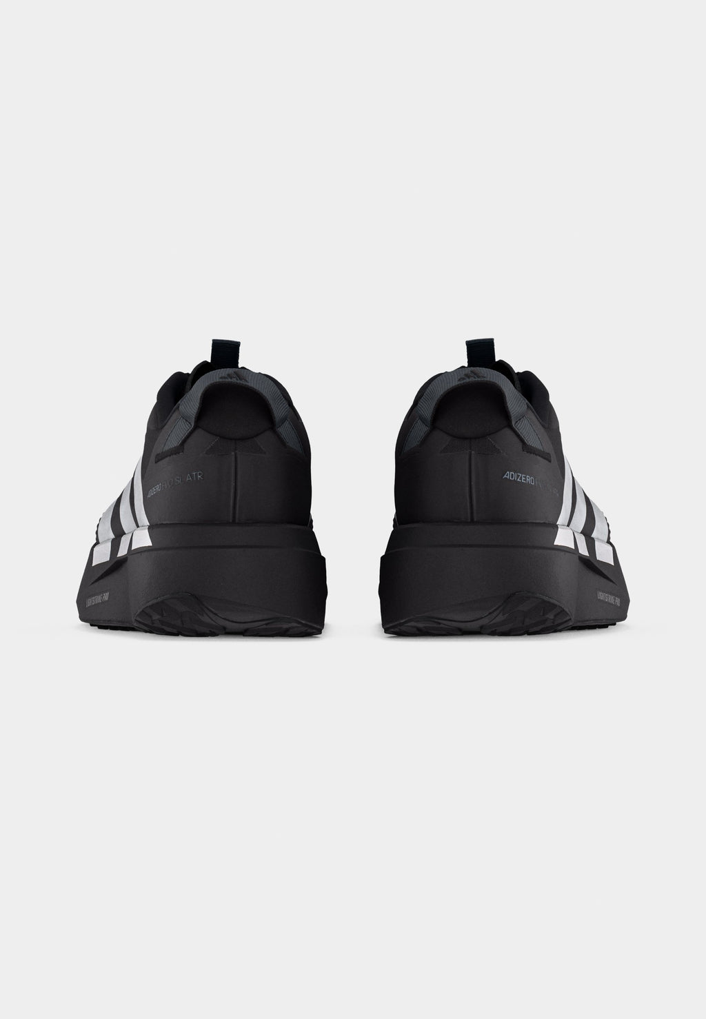 ADIZERO EVO SL ATR - Trainers - black/silver-coloured