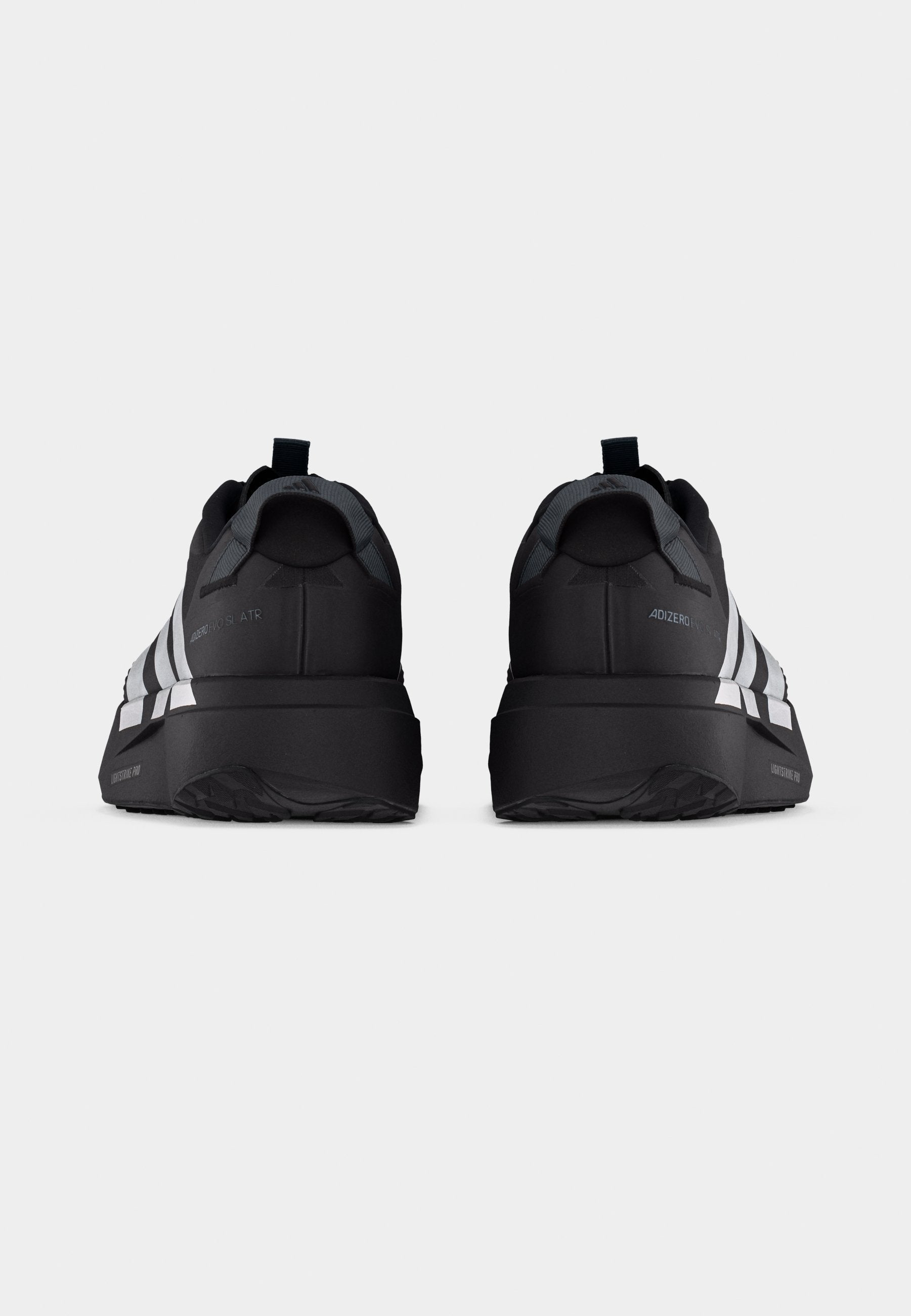 ADIZERO EVO SL ATR - Trainers - black/silver-coloured