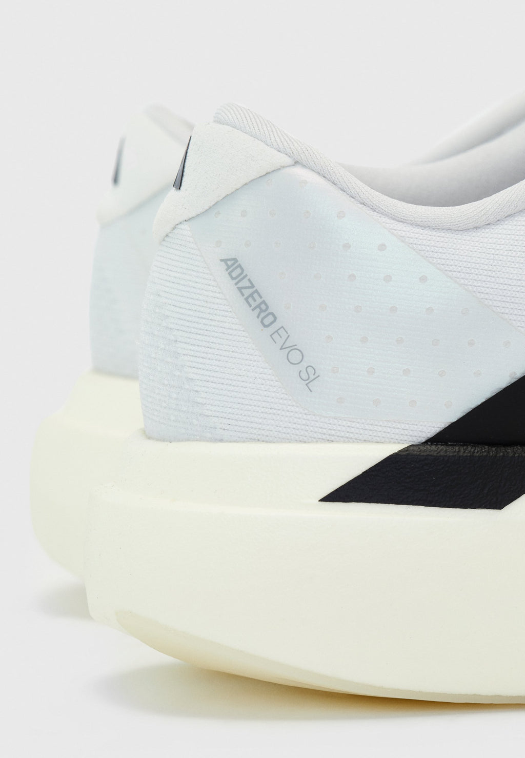 ADIZERO EVO SL W - Trainers - white/core black