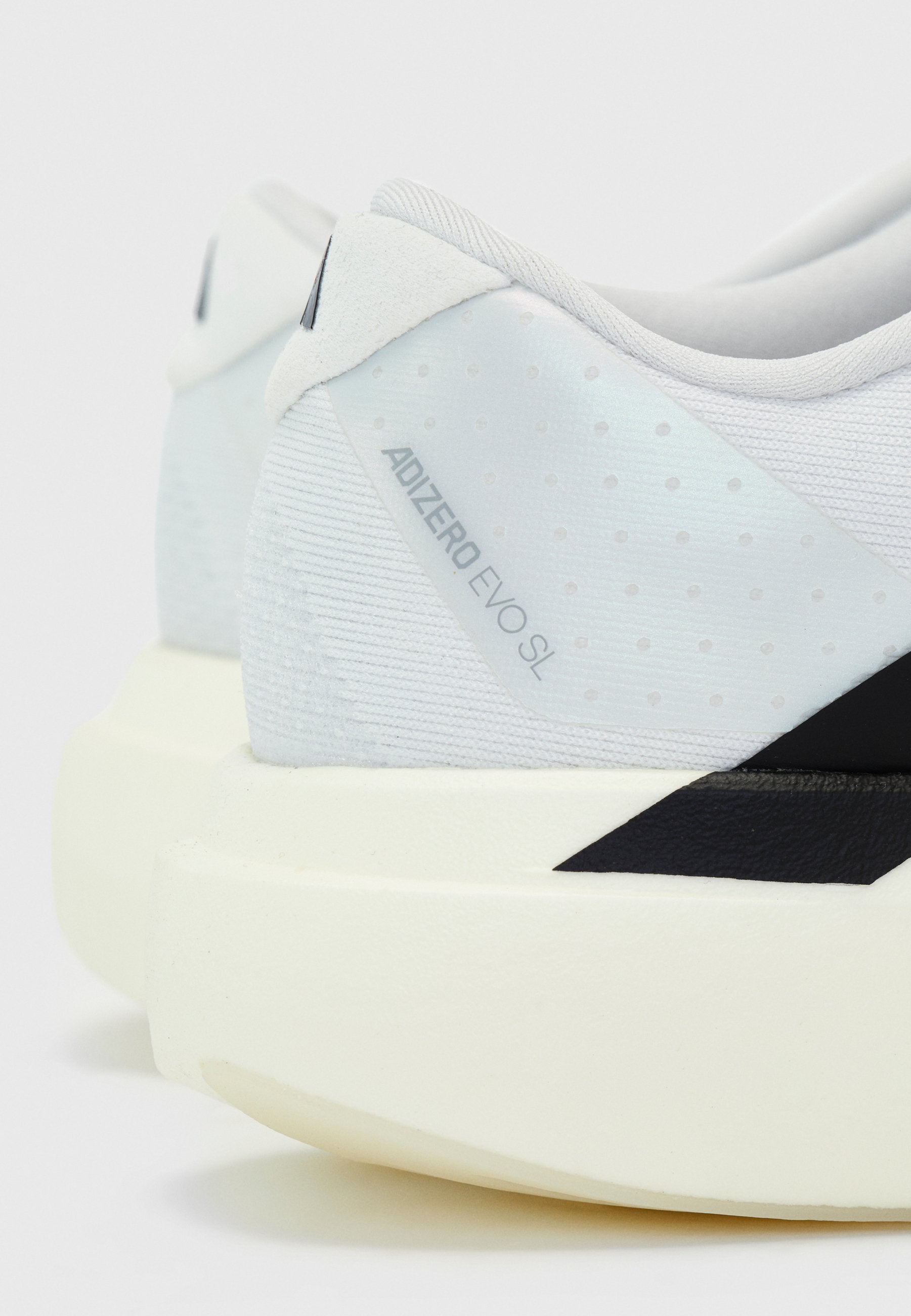 ADIZERO EVO SL W - Trainers - white/core black