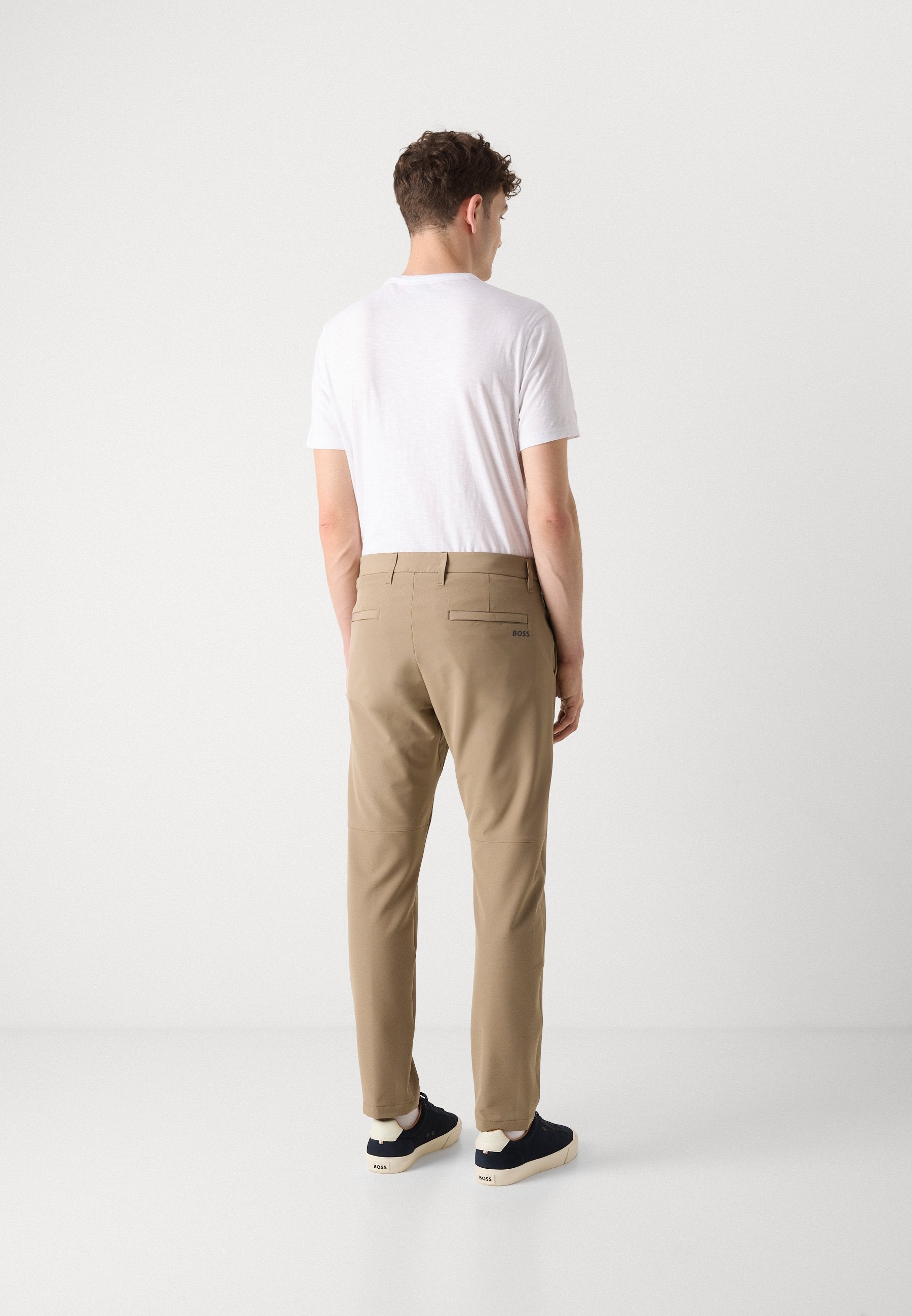 COMMUTER SLIM - Trousers - light pastel green