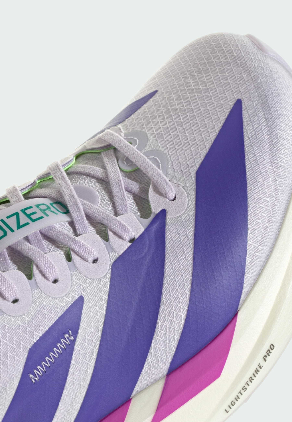 ADIZERO TAKUMI SEN 11 W - Chaussures de running sur route - teinte violette   violet solaire   vert vif