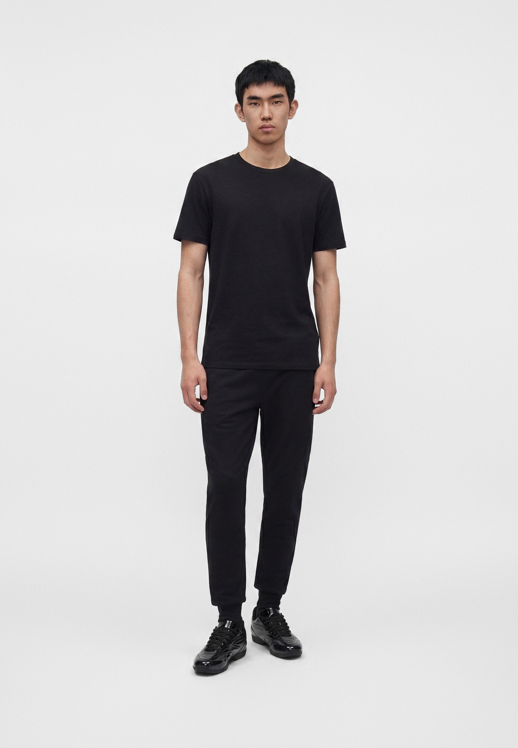 Slim Fit - Tracksuit bottoms - black