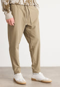 T_FLEX - Trousers - light/pastel green