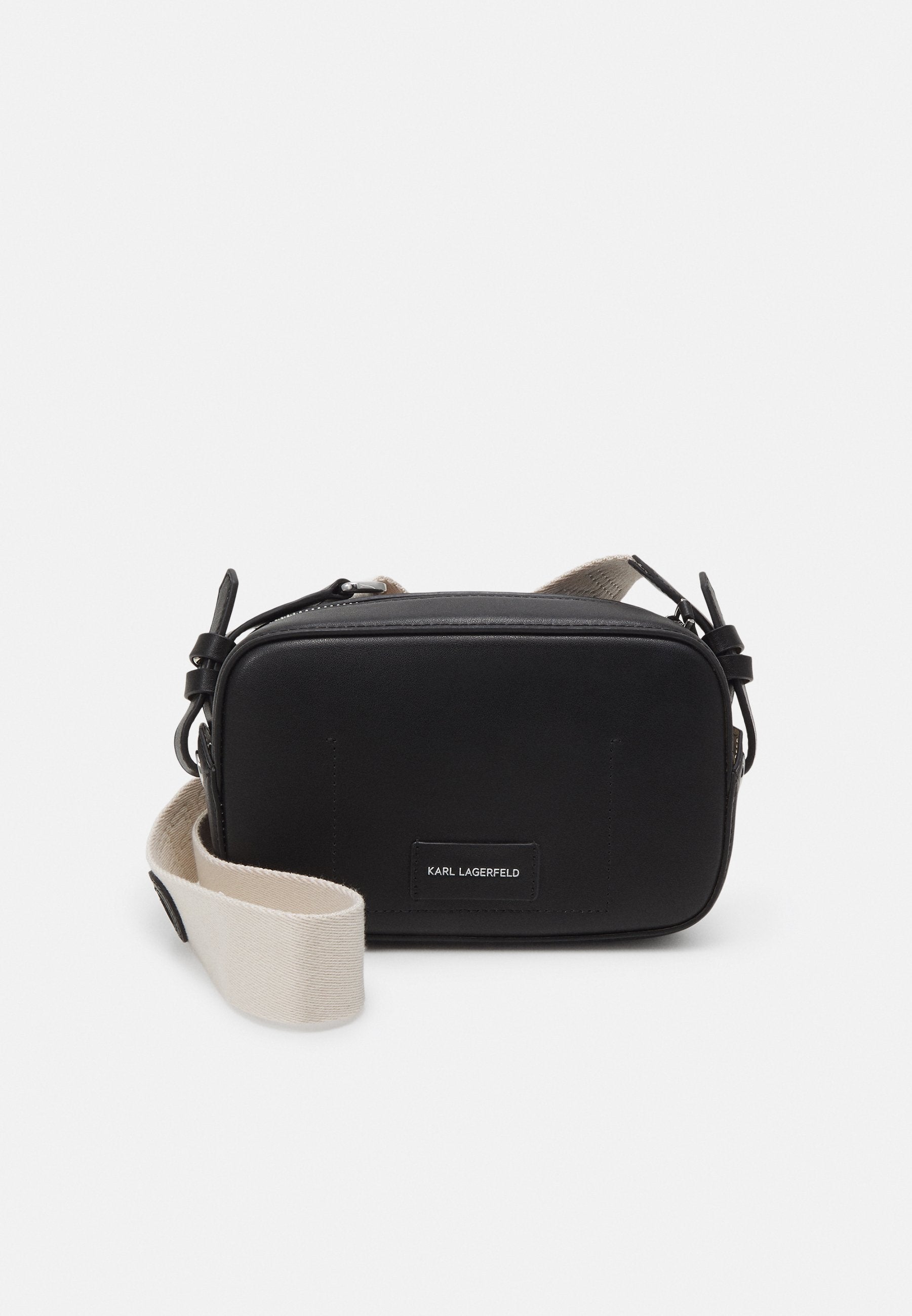 CIRCLE CAMERABAG PERFORATED - Cross body bag - black