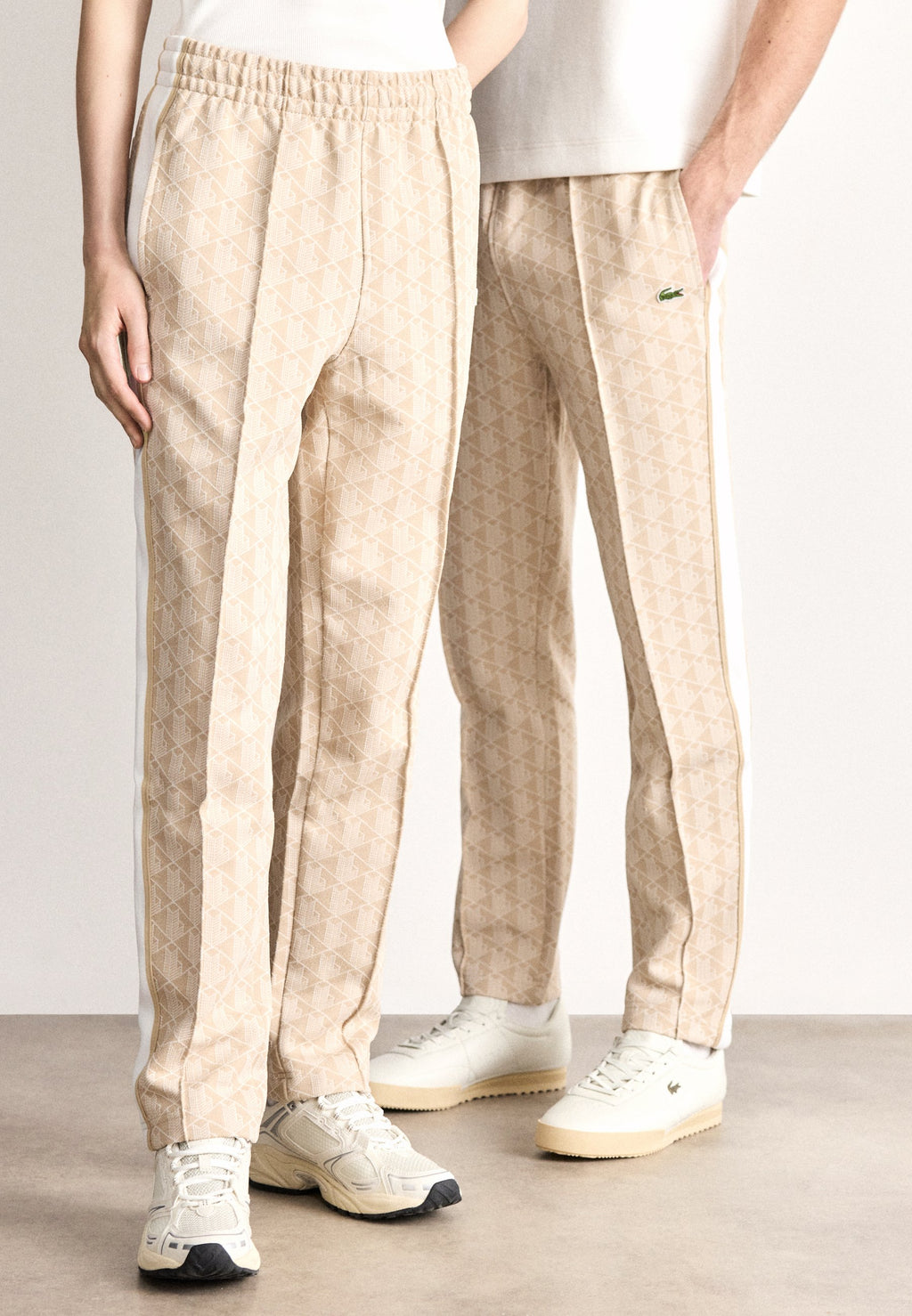 UNISEX - Tracksuit bottoms - lionne/flour