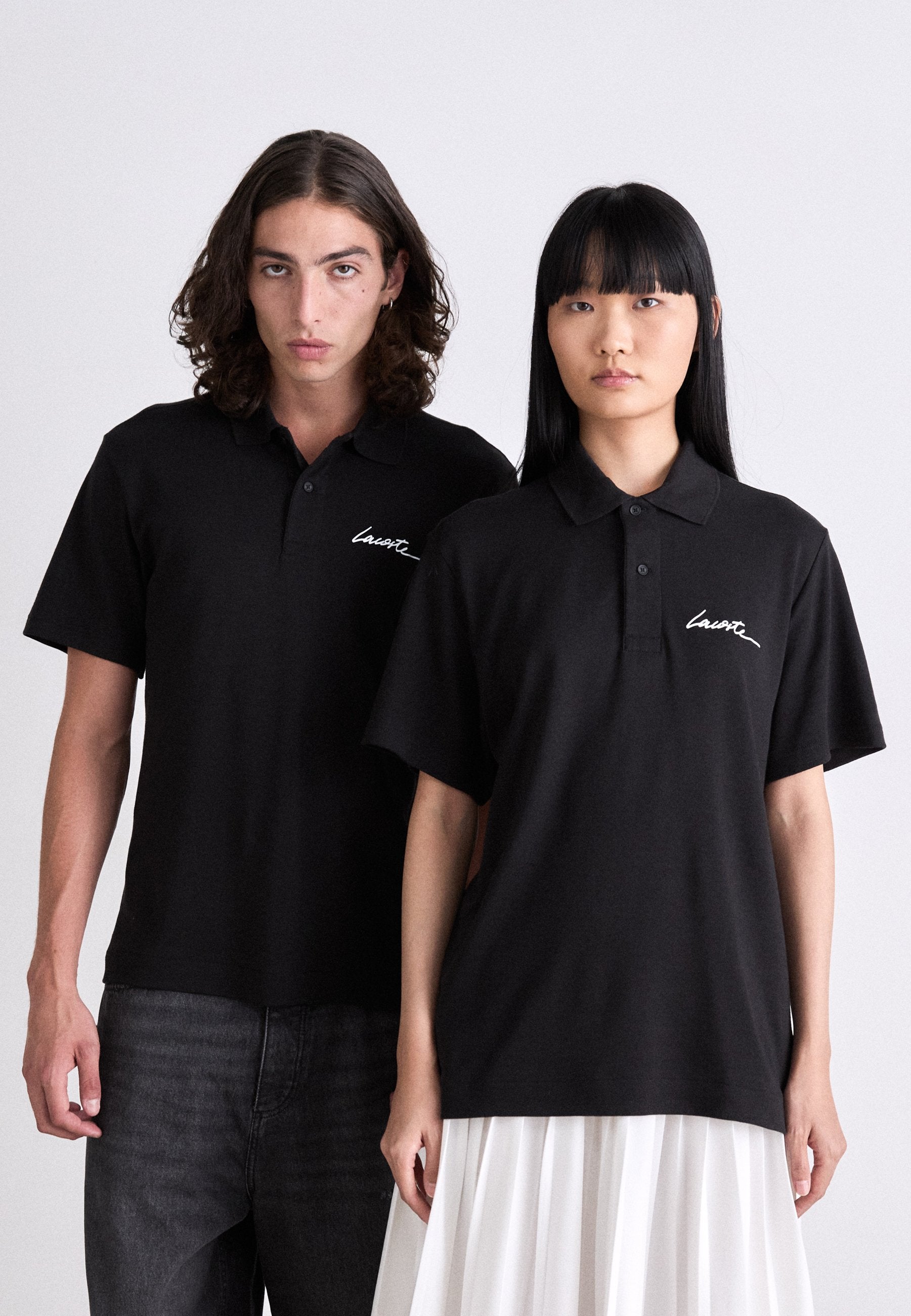 UNISEX - Polo shirt - black