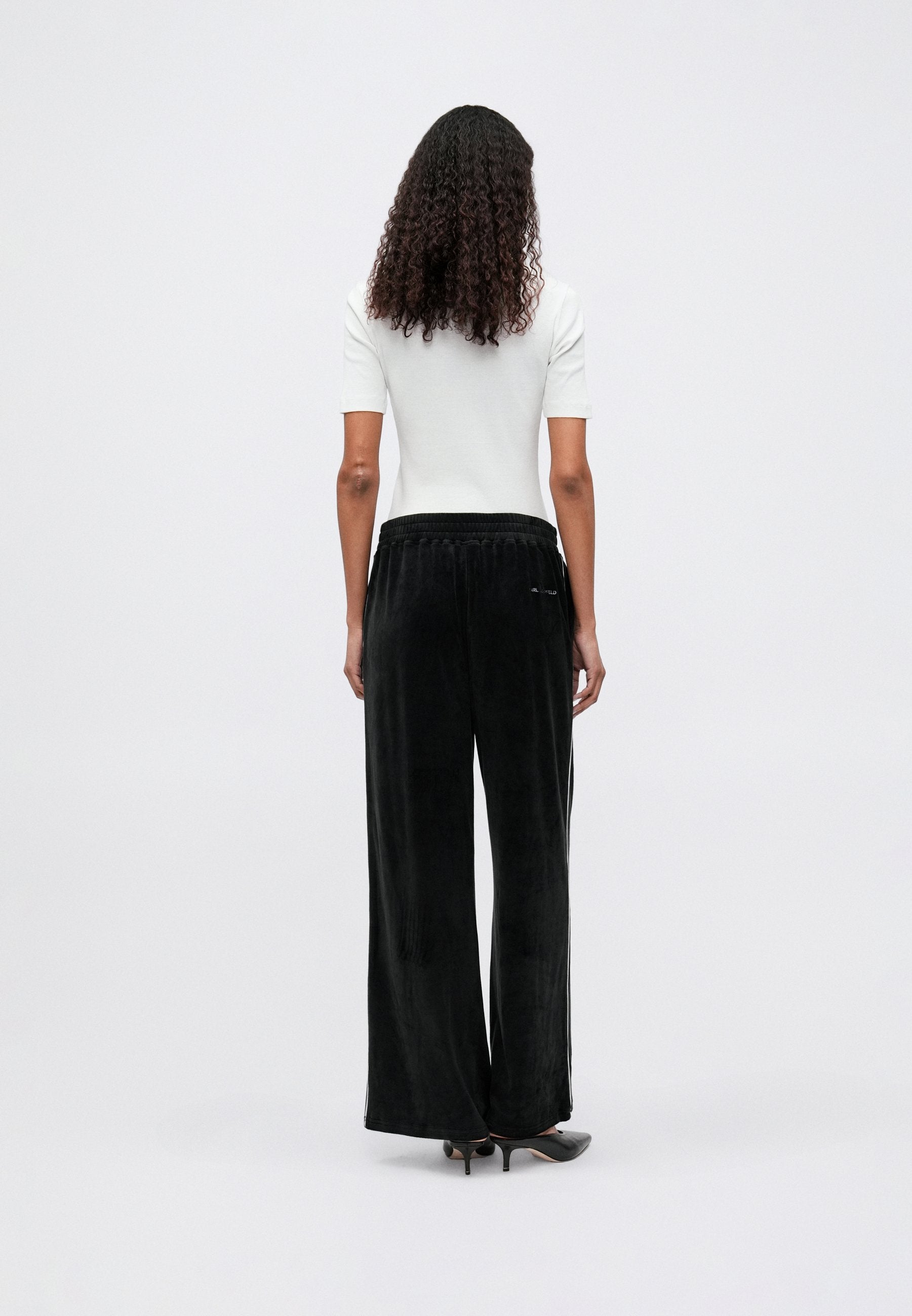 IKON  - Tracksuit bottoms - black