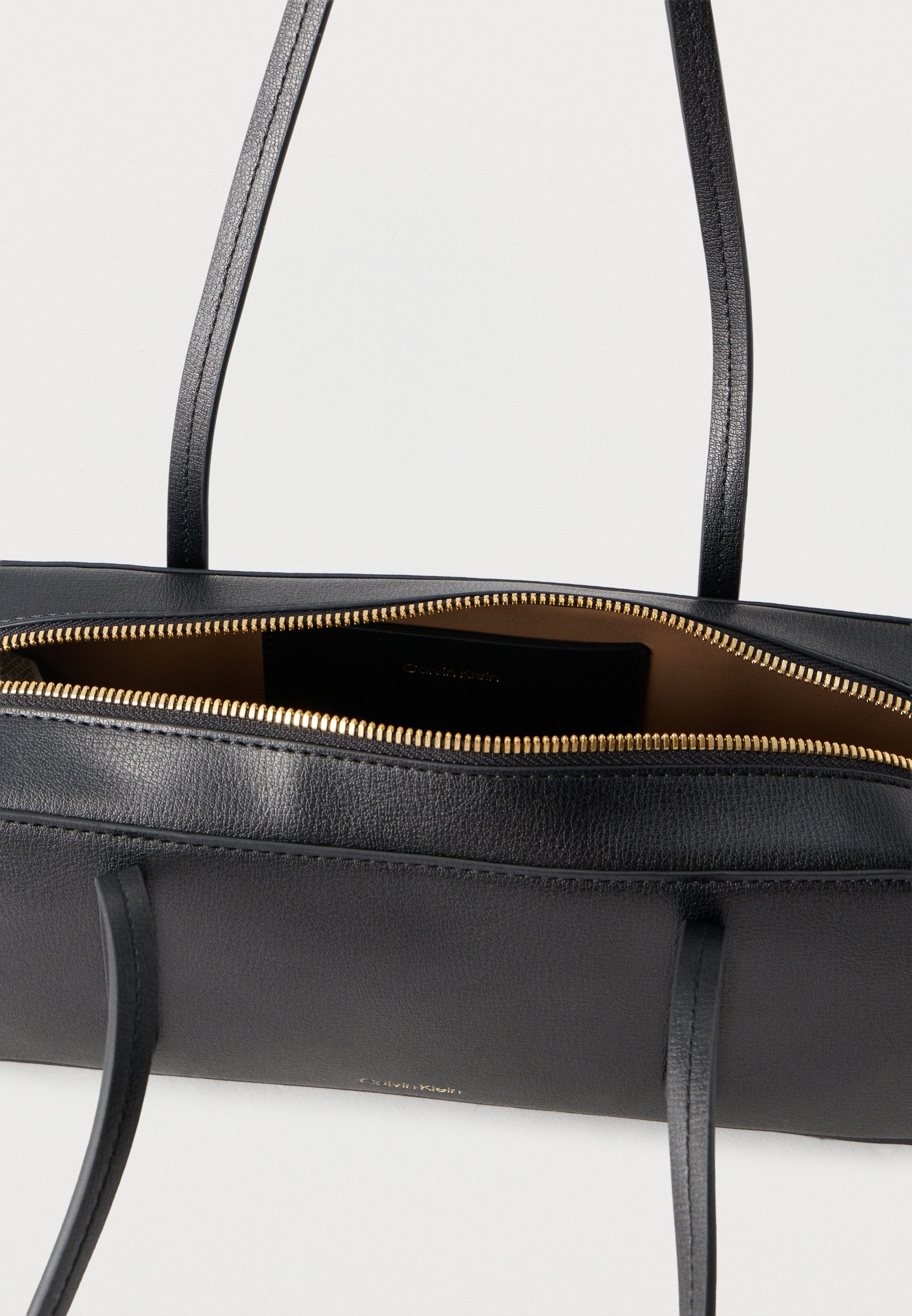 FOIL LOGO BAULETTO - Handbag - black/toasted coconut