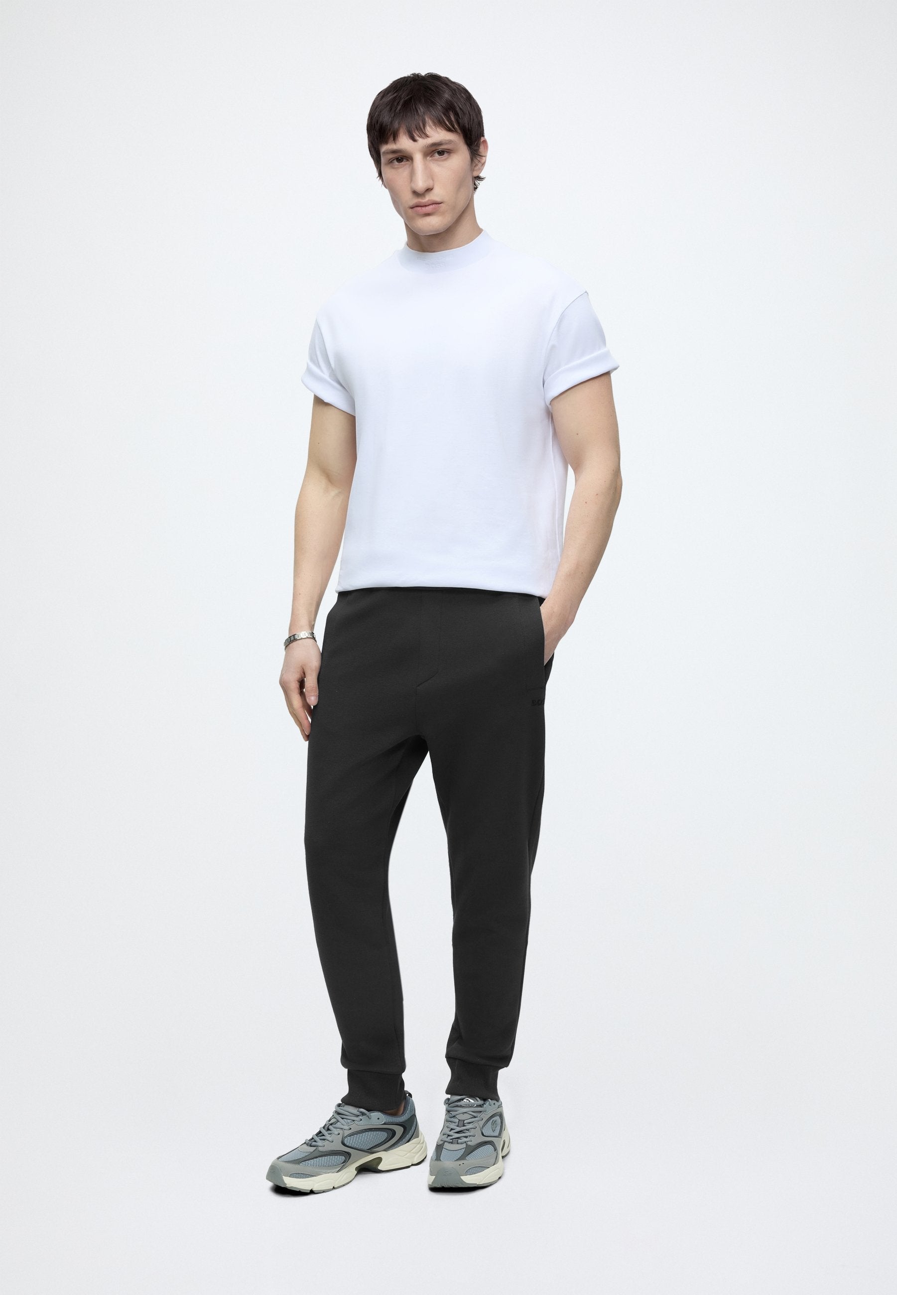 UNION HADIKO - Tracksuit bottoms - dark blue