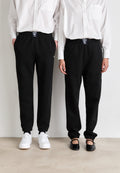 UNISEX - Tracksuit bottoms - black
