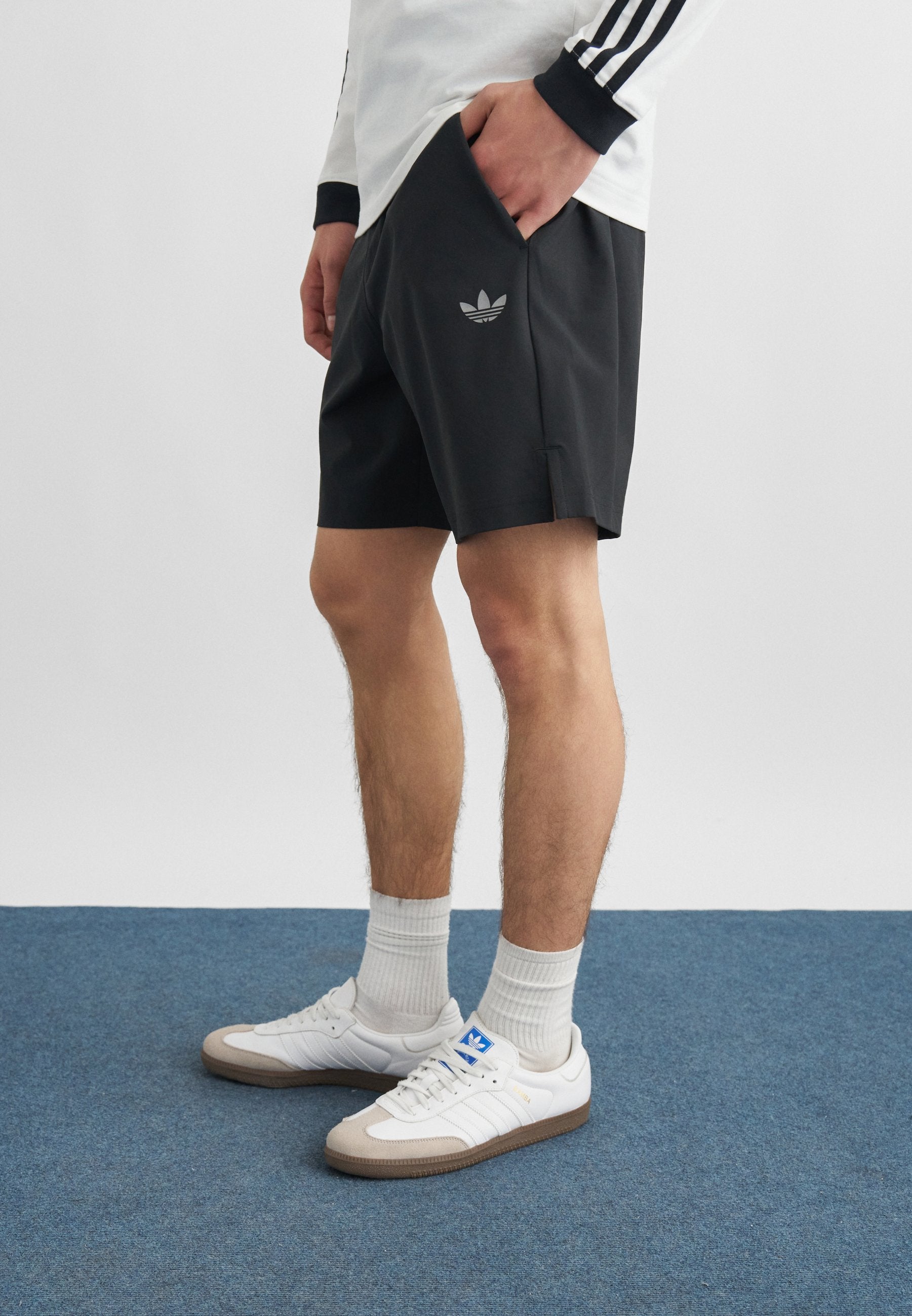 TECH ESS WV SHO - Tracksuit bottoms - black