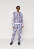 ESSENTIALS 3 STRIPES ANIMAL AOP - Tracksuit - multicolor/ice purple