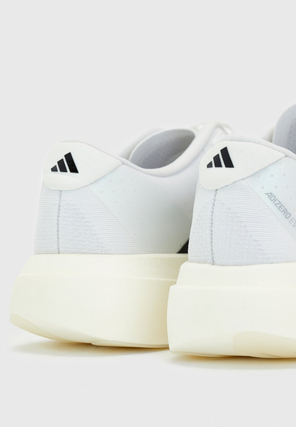 ADIZERO EVO SL W - Trainers - white/core black